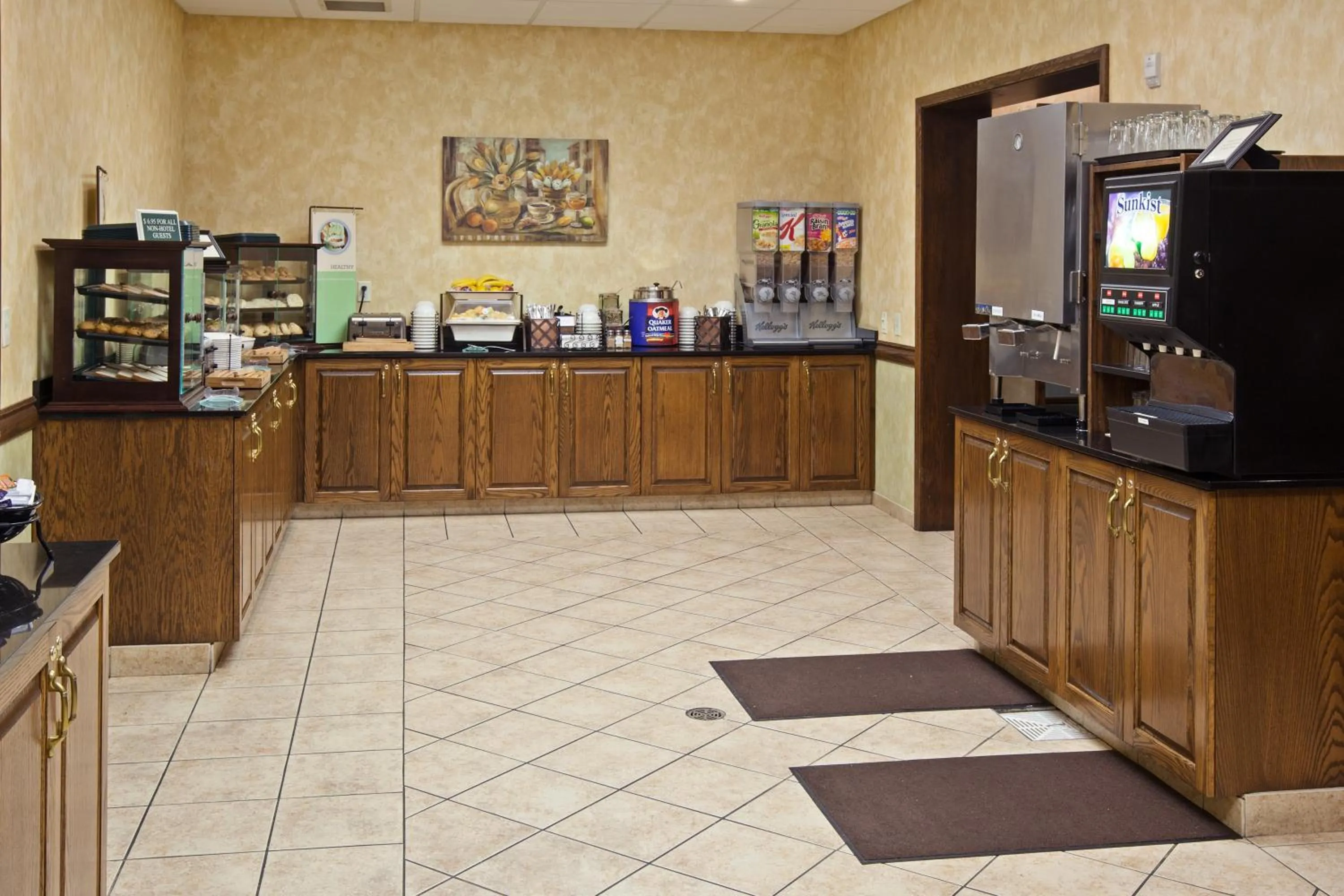 Communal kitchen in Country Inn & Suites by Radisson, Grand Rapids East, MI
