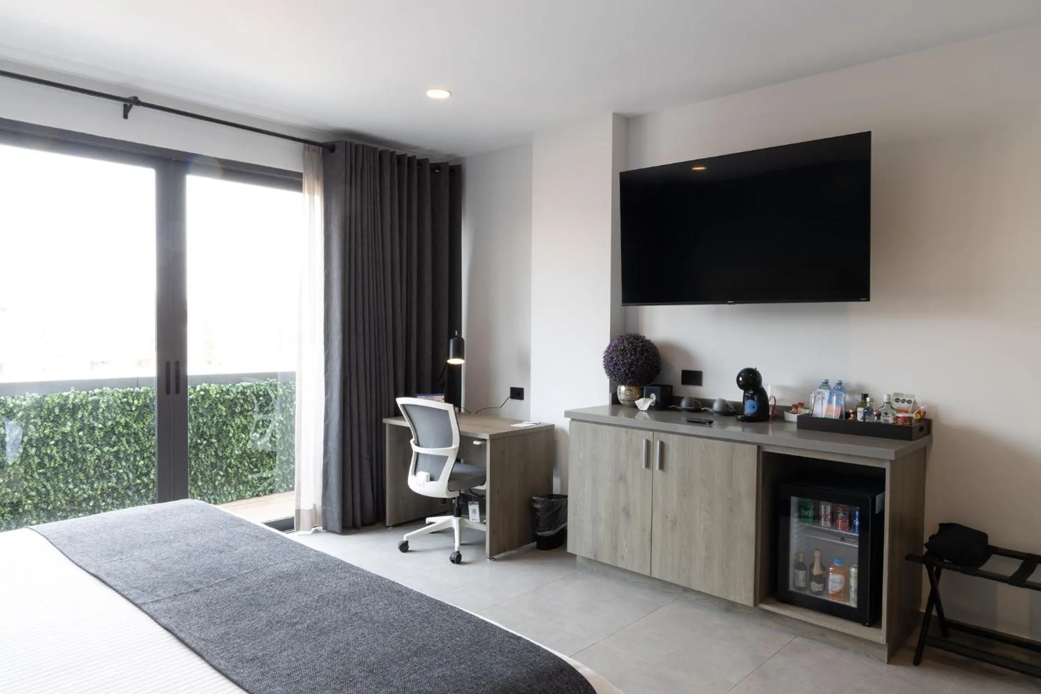 Bed in TH HOTEL & VIVIENDA