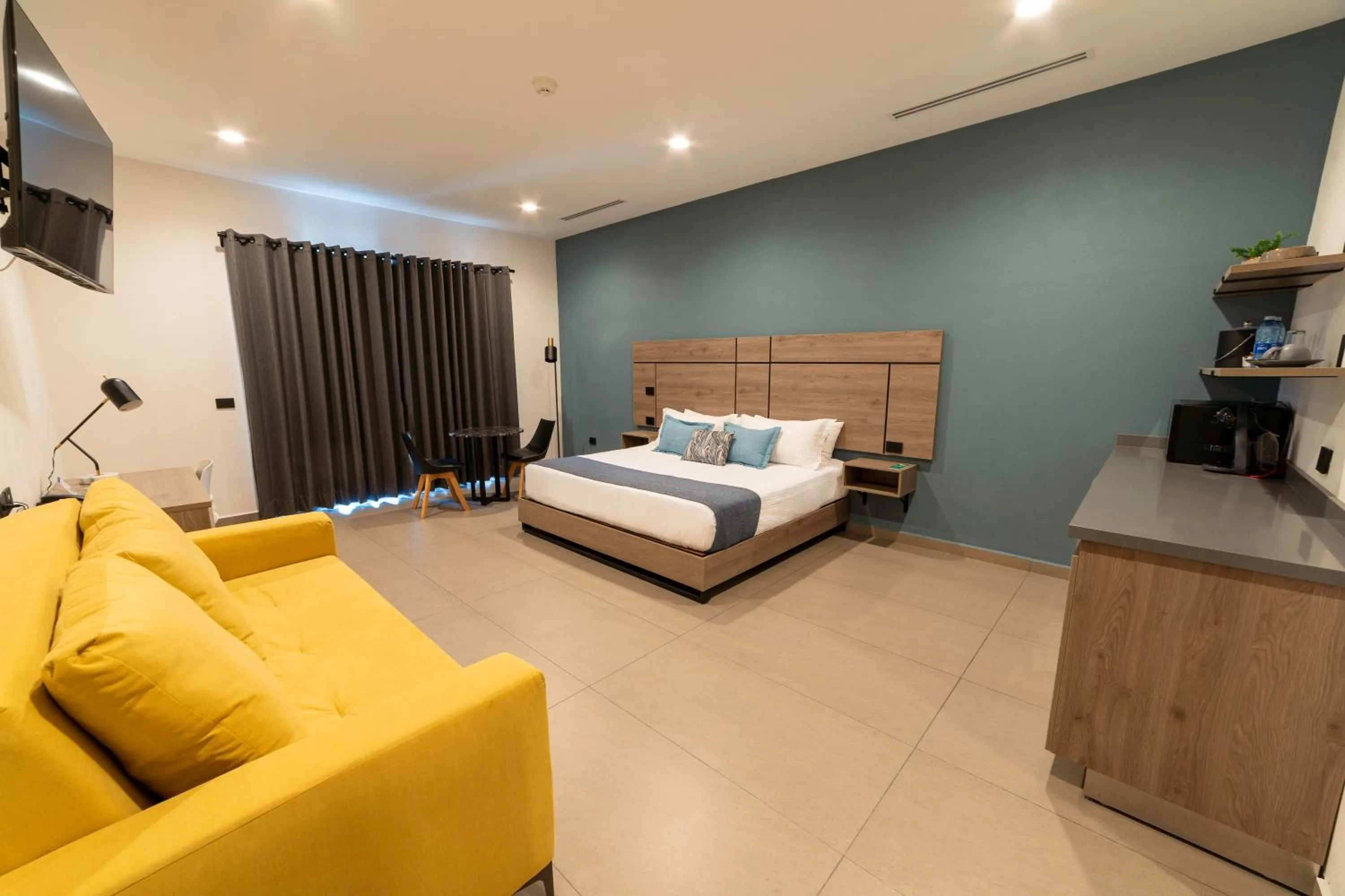 Photo of the whole room, Bed in TH HOTEL & VIVIENDA