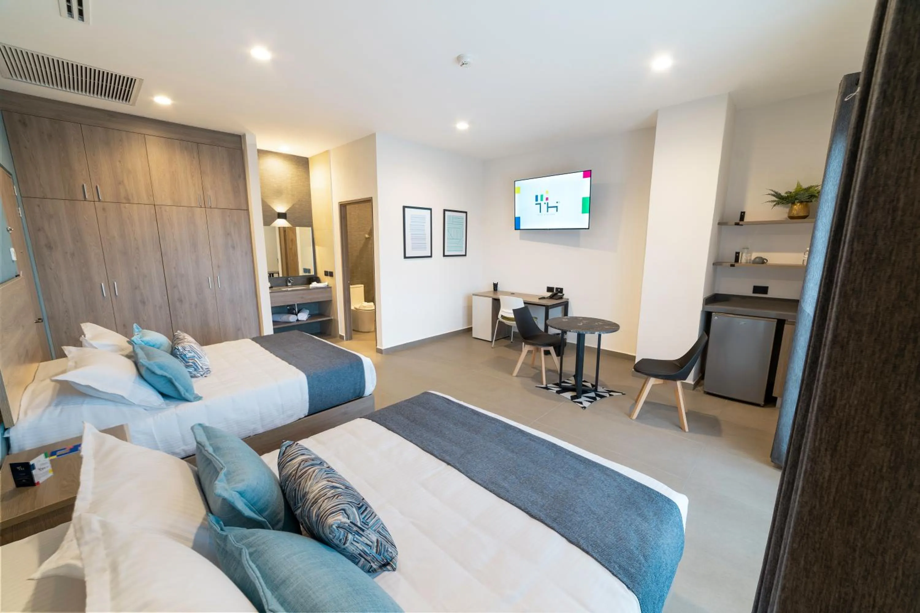 Photo of the whole room, Bed in TH HOTEL & VIVIENDA