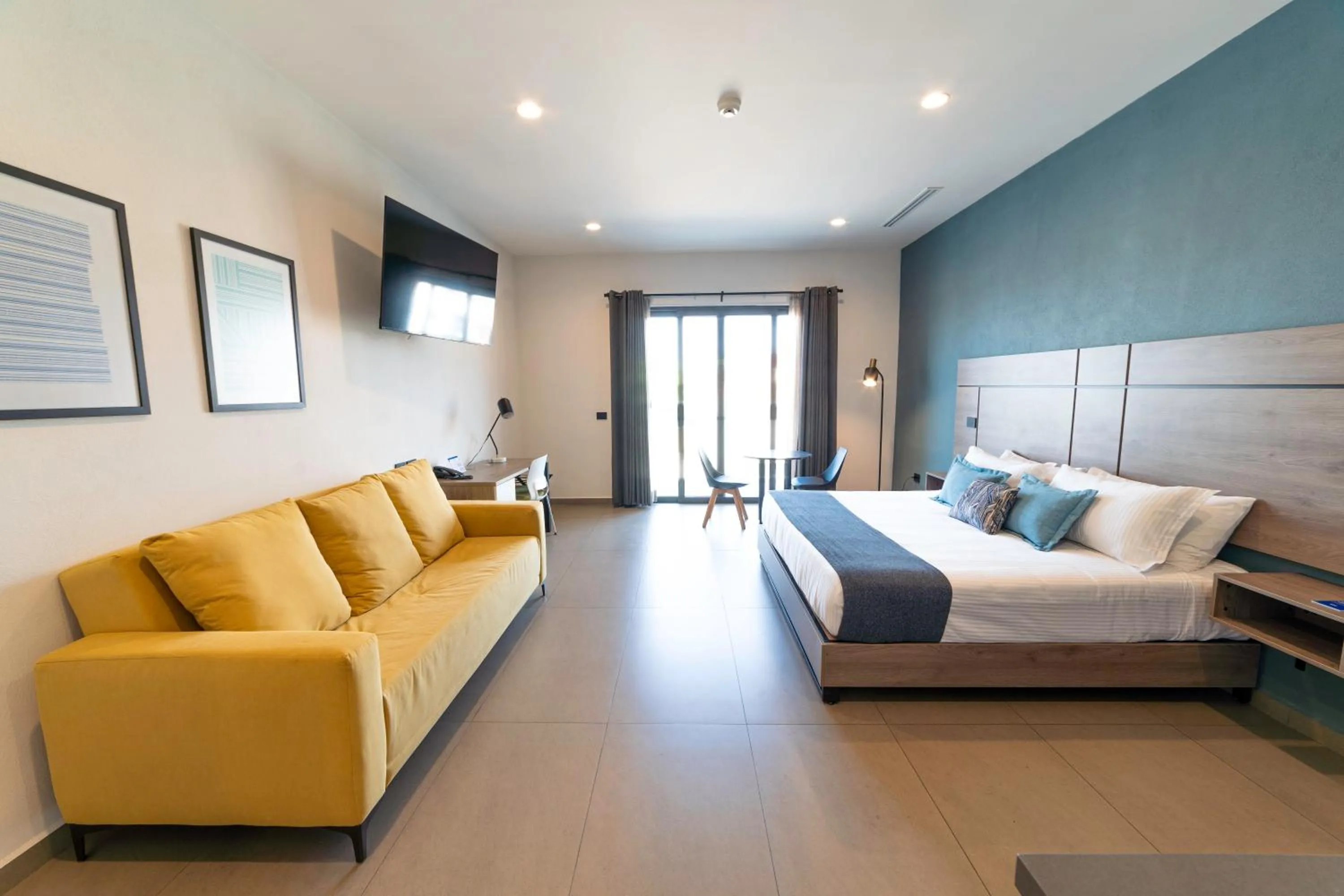 Photo of the whole room, Bed in TH HOTEL & VIVIENDA