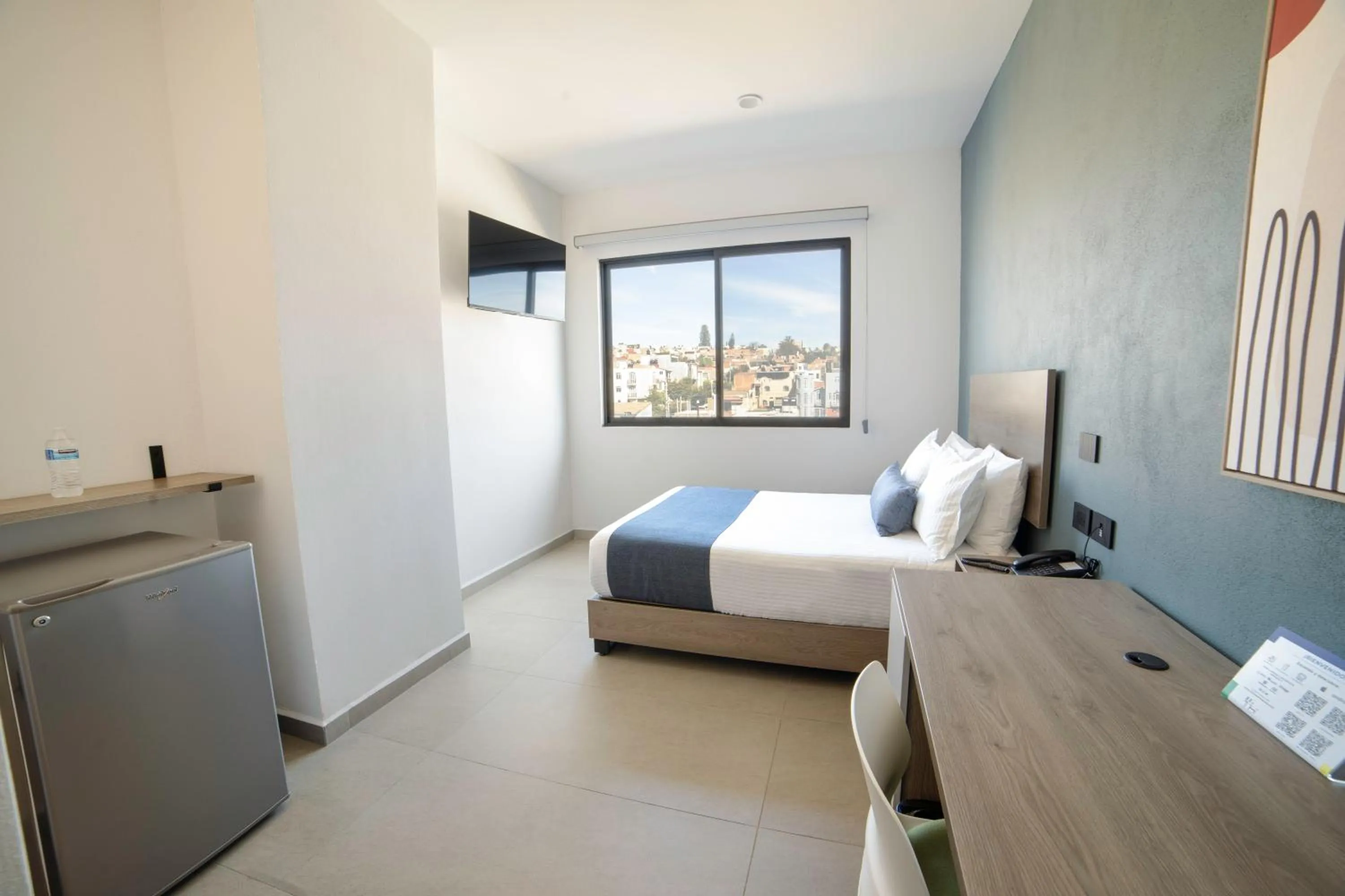 Photo of the whole room, Bed in TH HOTEL & VIVIENDA