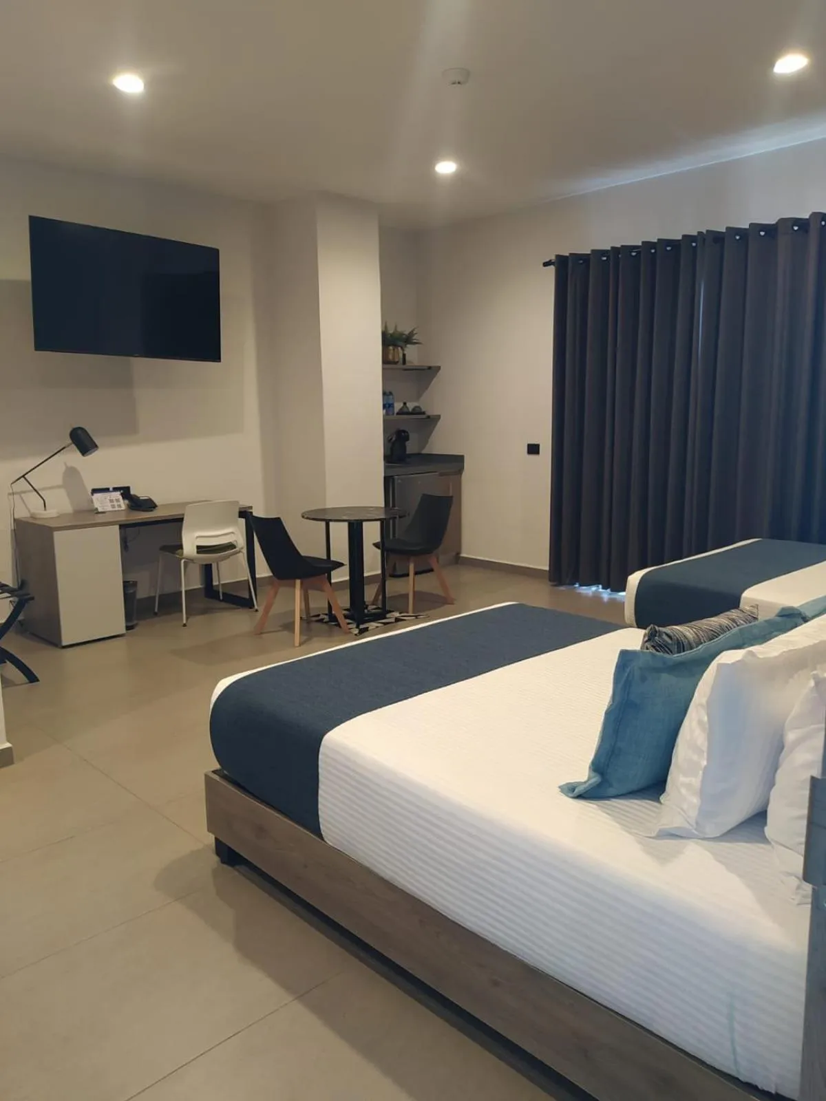 Bed in TH HOTEL & VIVIENDA