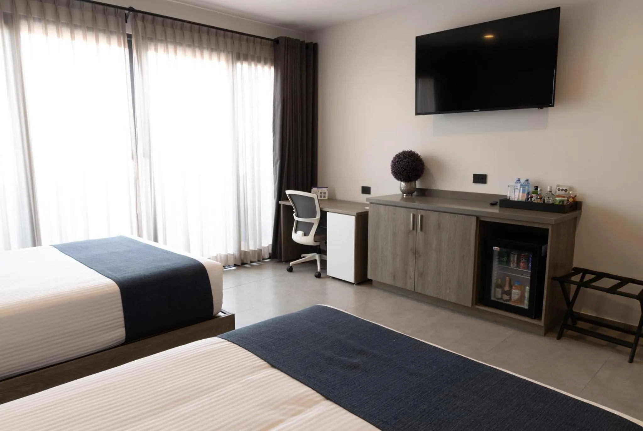 Bed in TH HOTEL & VIVIENDA