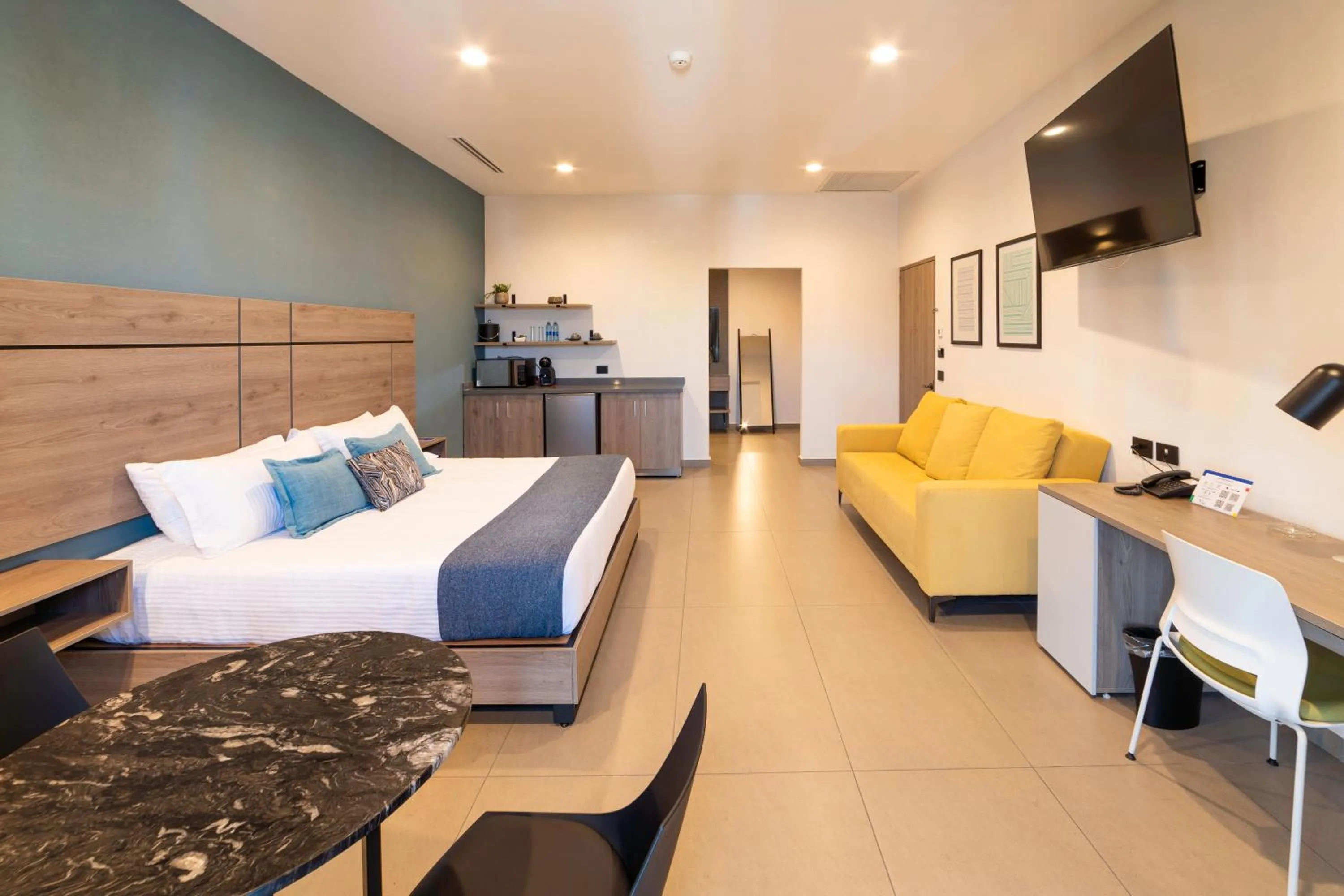 Photo of the whole room, Bed in TH HOTEL & VIVIENDA