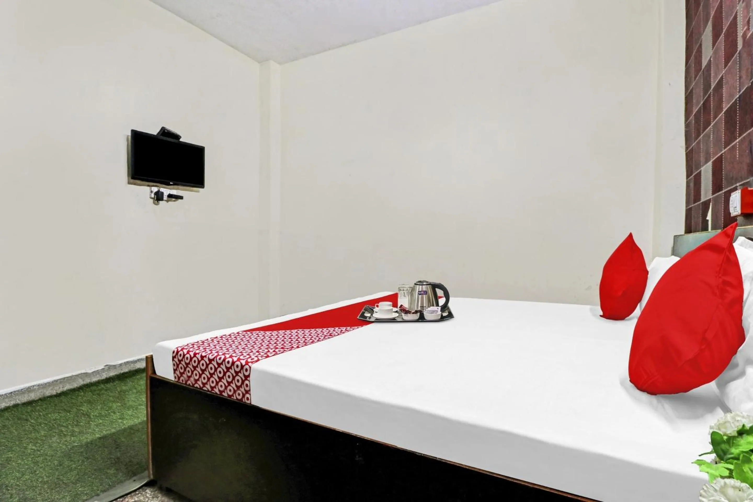 Bedroom in Hotel O Lion Home Stay