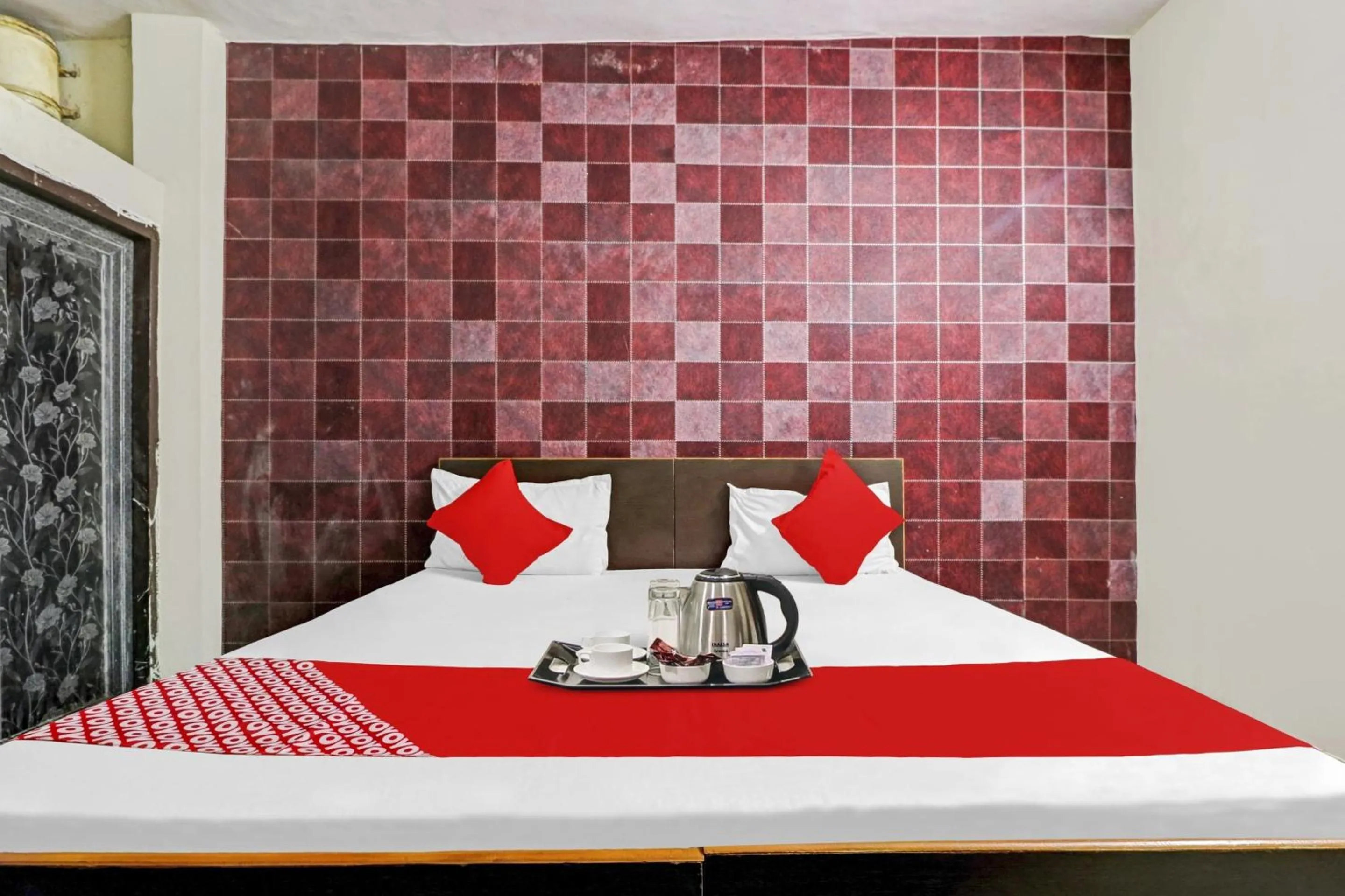 Bedroom in Hotel O Lion Home Stay