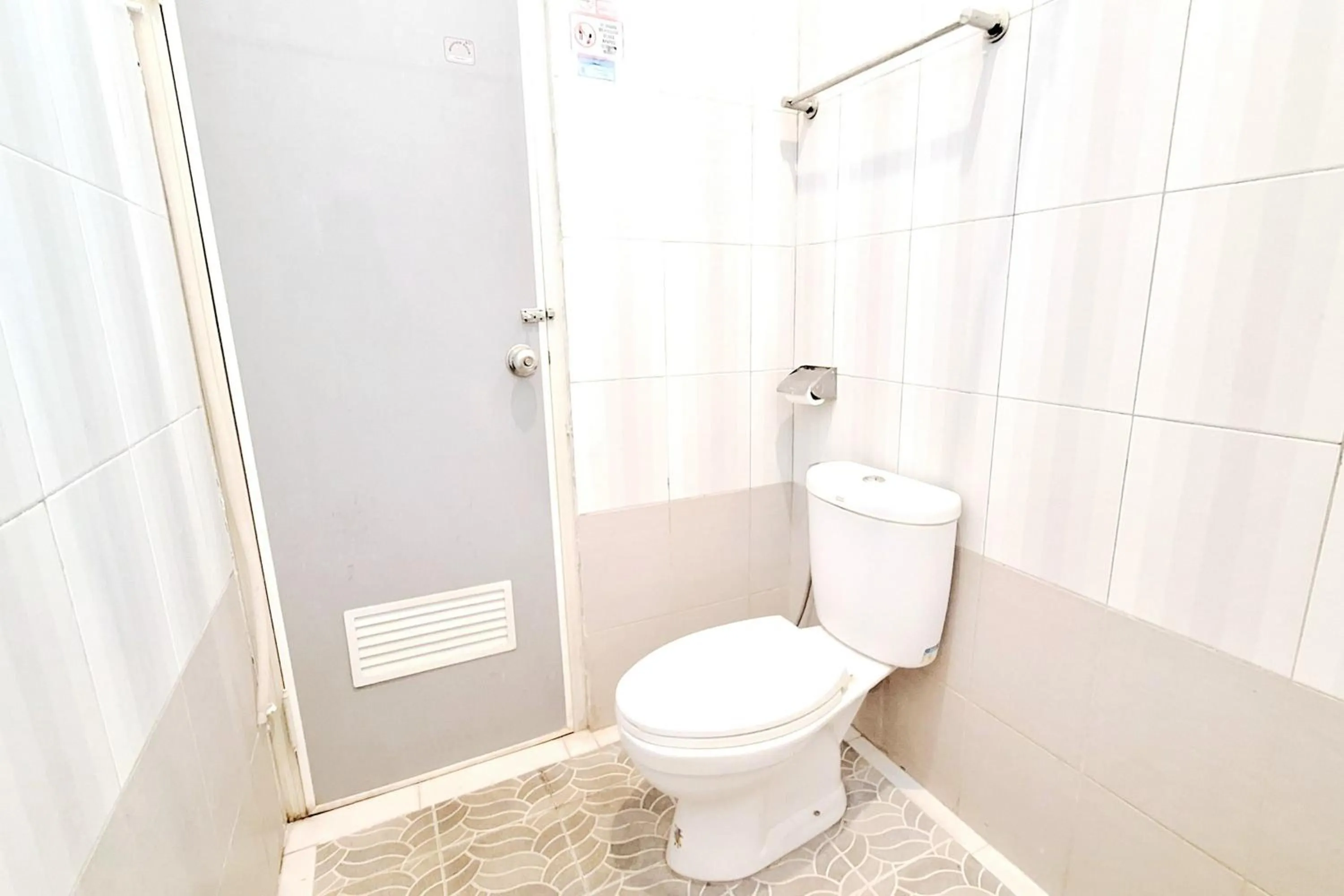 Bathroom in Urbanview The Halona near Jawa Timur Park 4