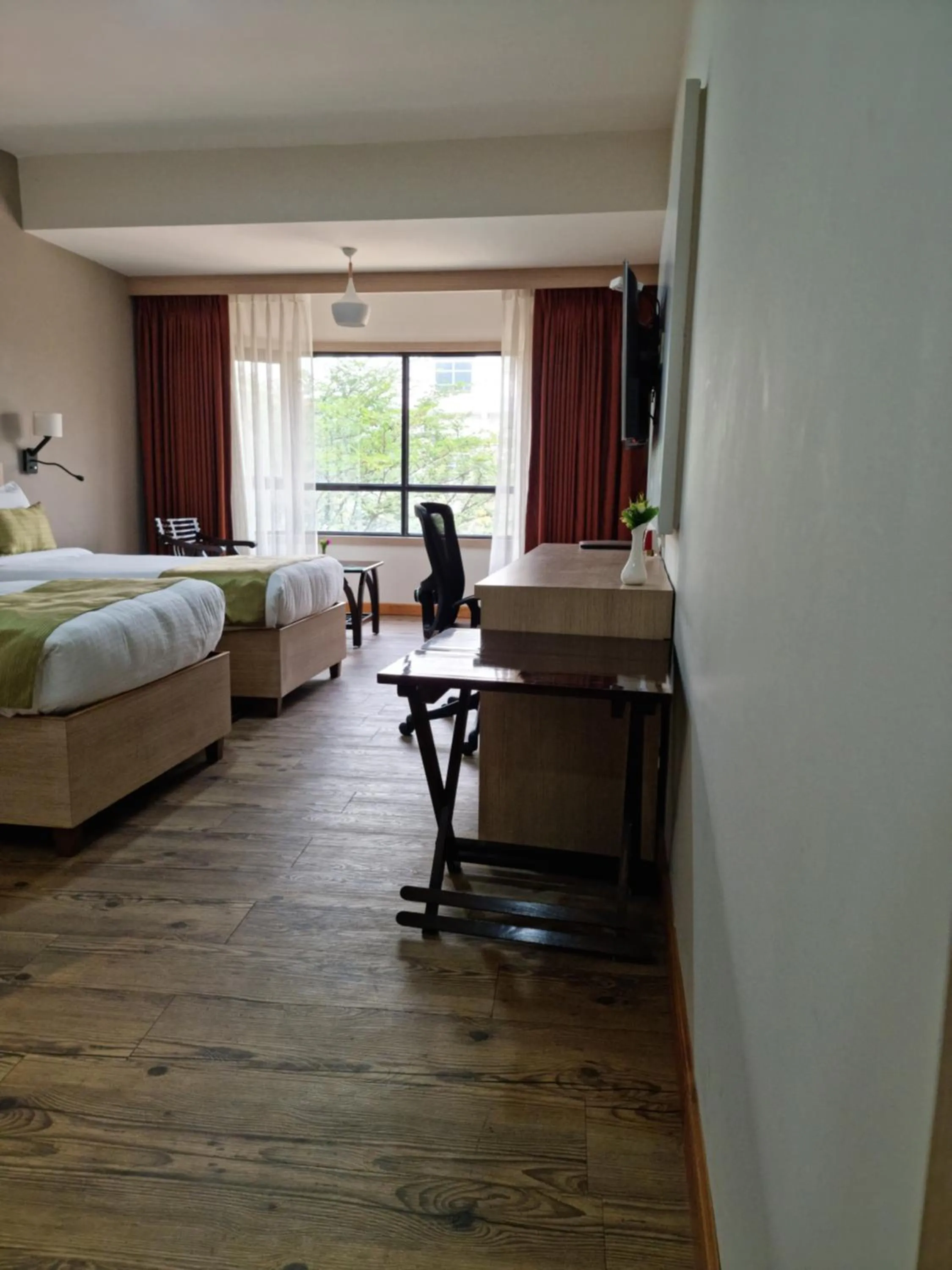 Living room, Bed in Hotel Nirvana by Luxury International