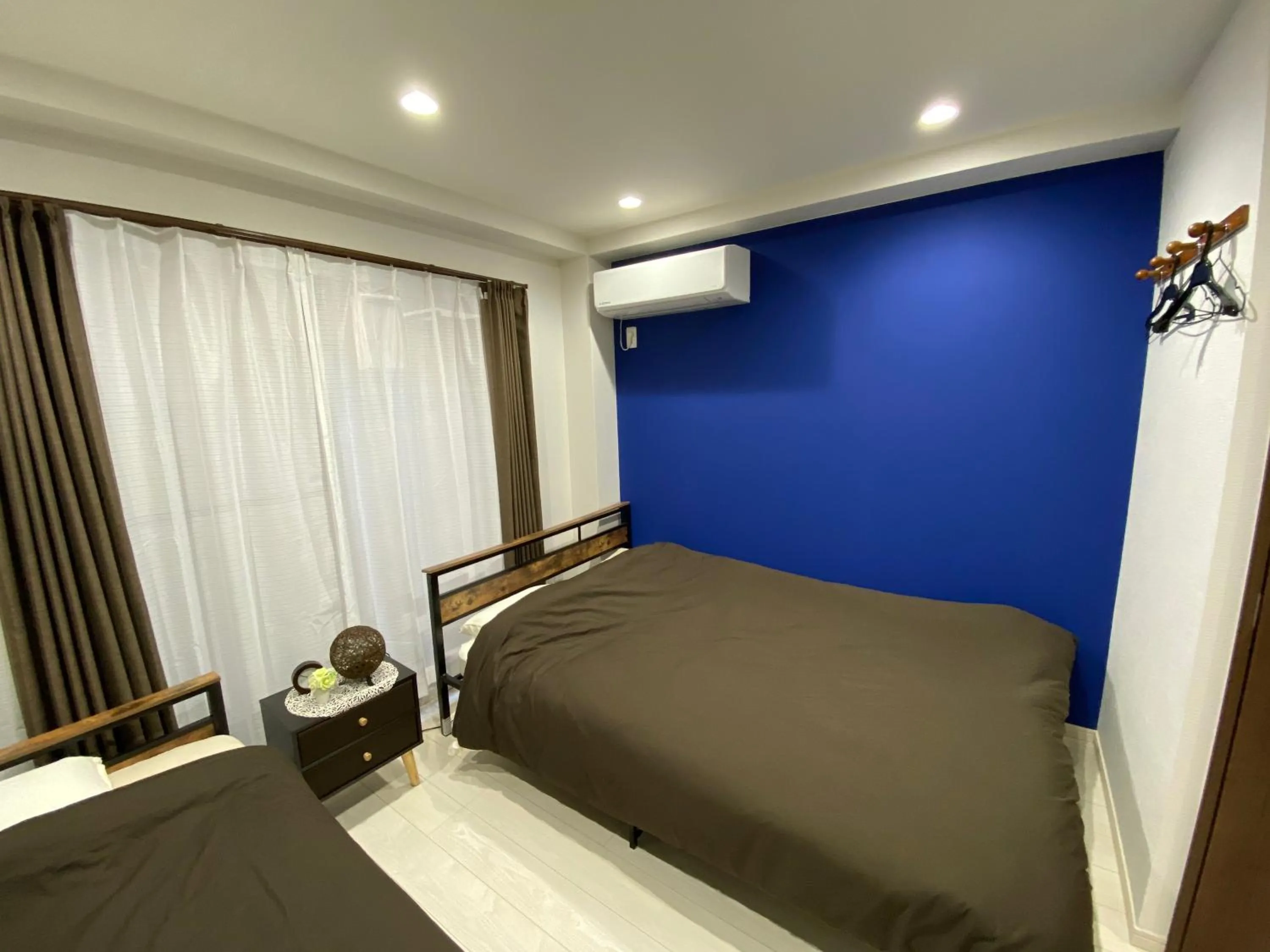 Bed in Wonderful stay TOKYO nakanoshinbashi