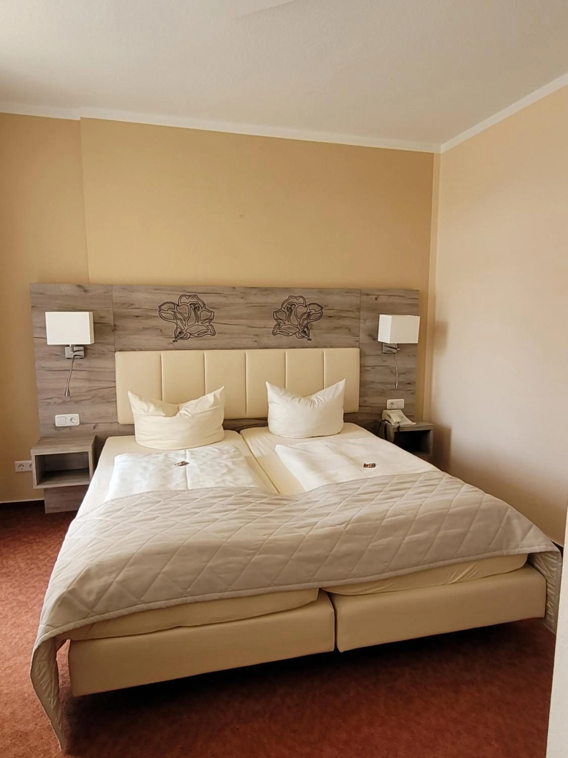 Bed in Hotel Rosengarten