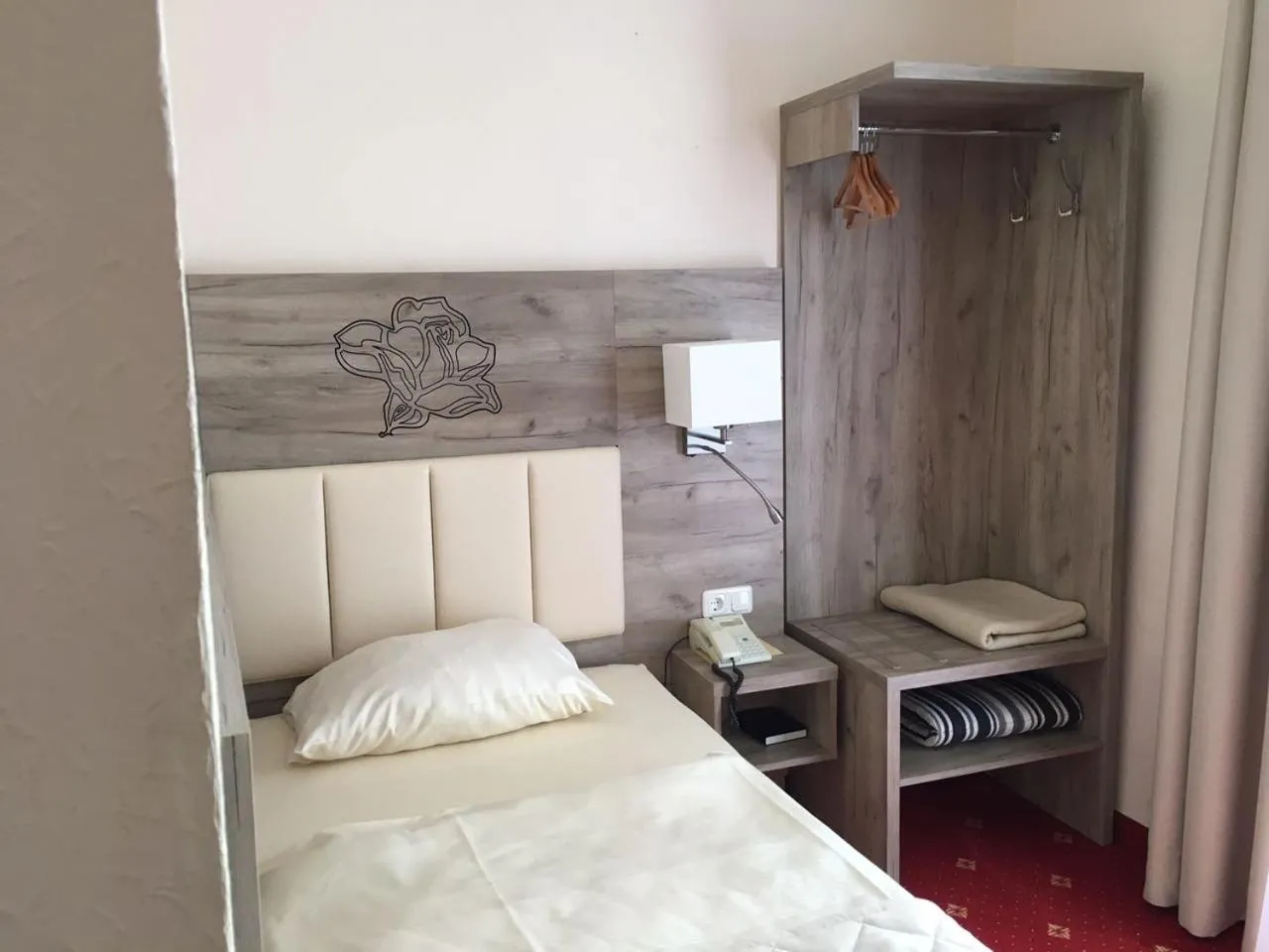 Photo of the whole room, Bed in Hotel Rosengarten