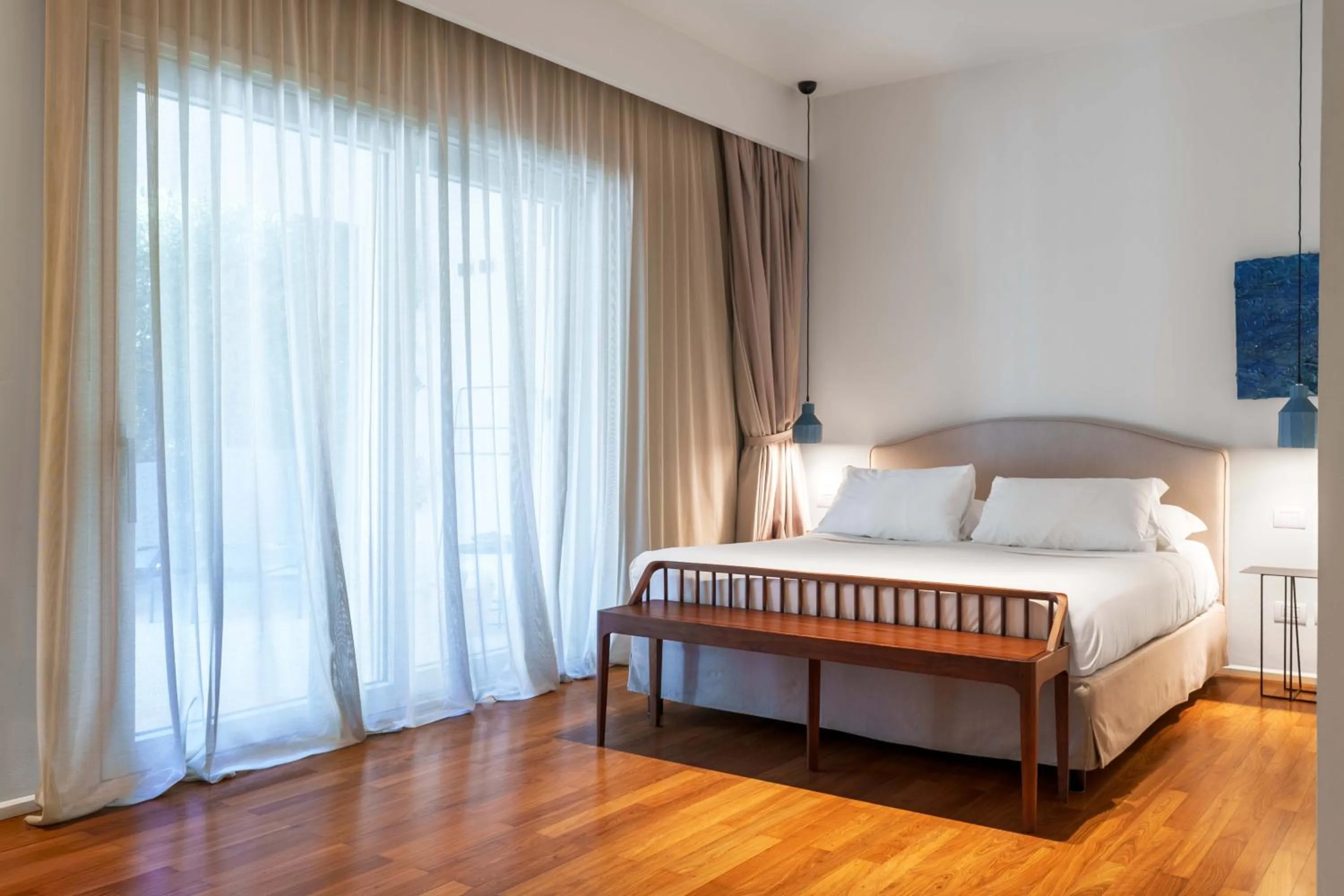 Bed in Domìa Boutique Hotel e Cucina