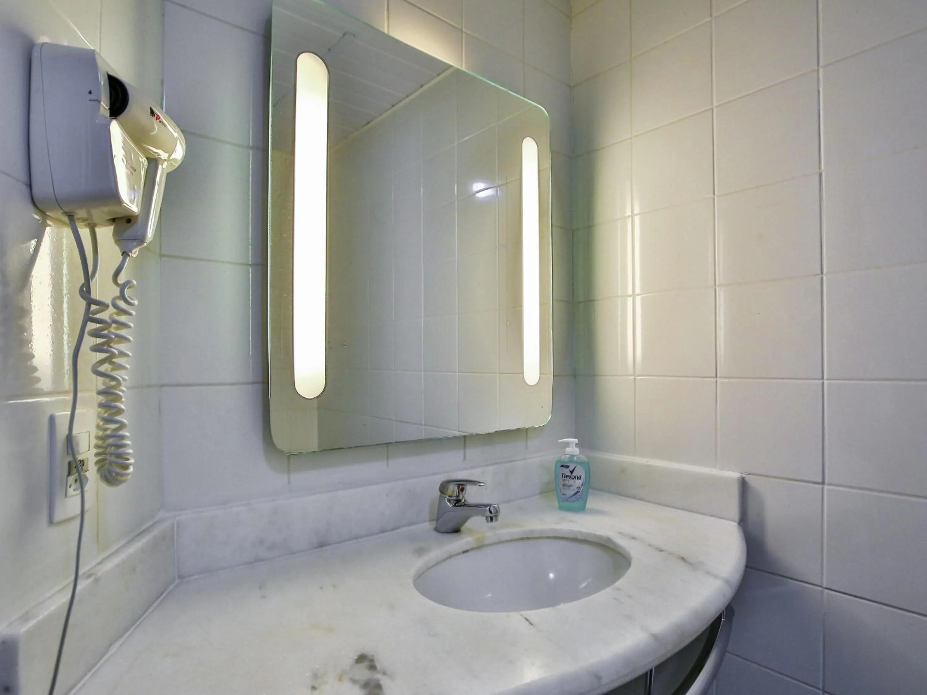 Bedroom in ibis Goiânia