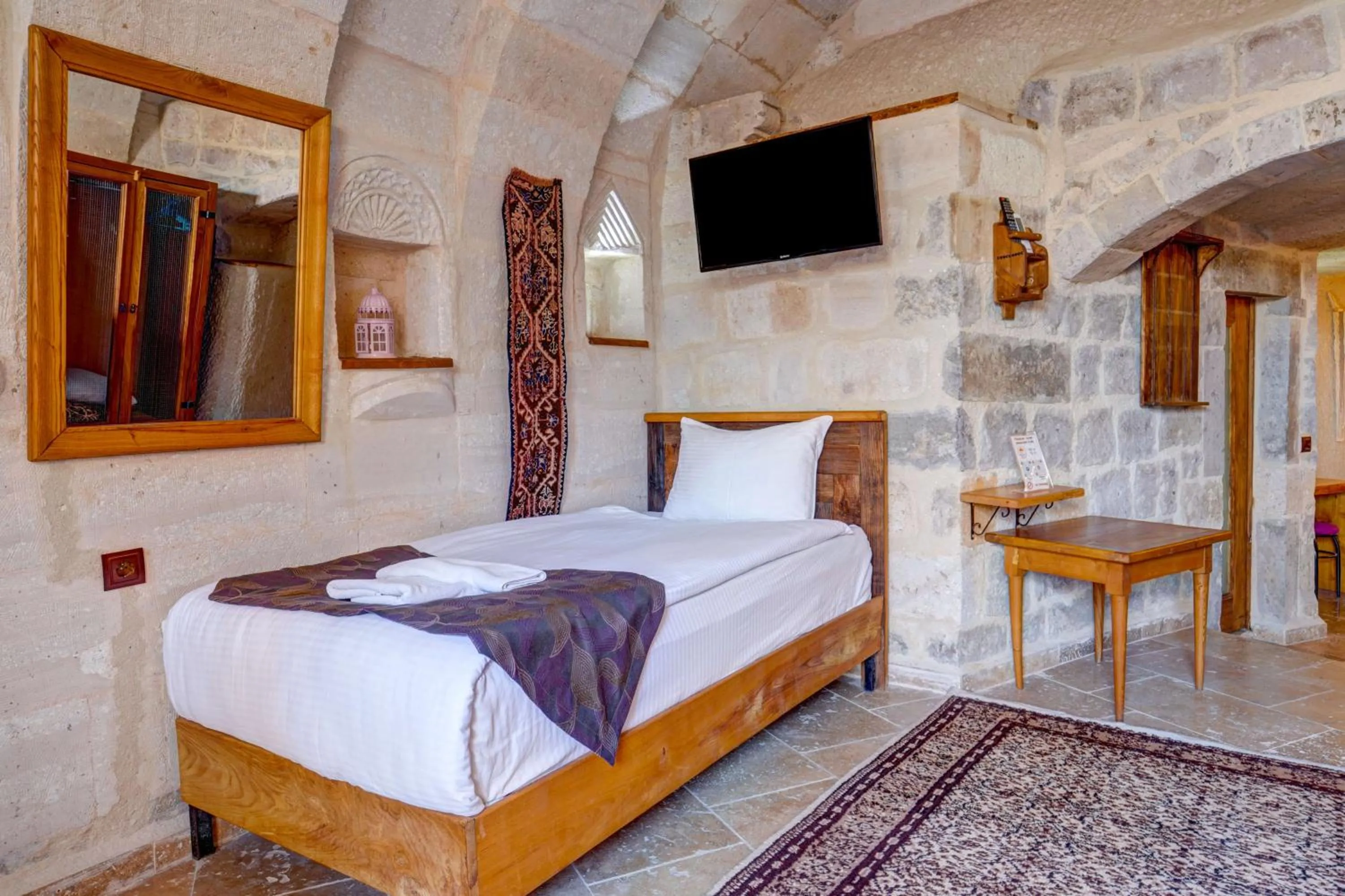 Bed in Avilla Cave Hotel