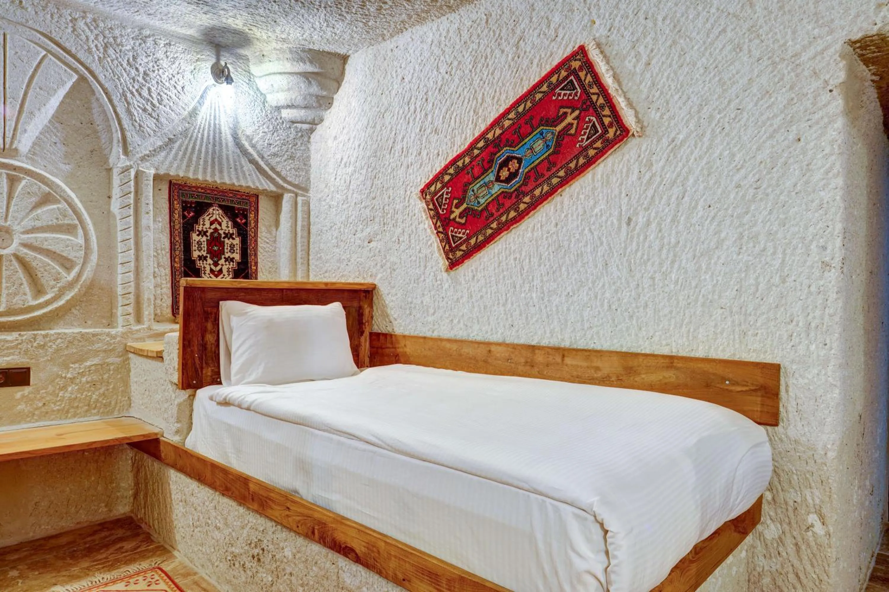 Bed in Avilla Cave Hotel