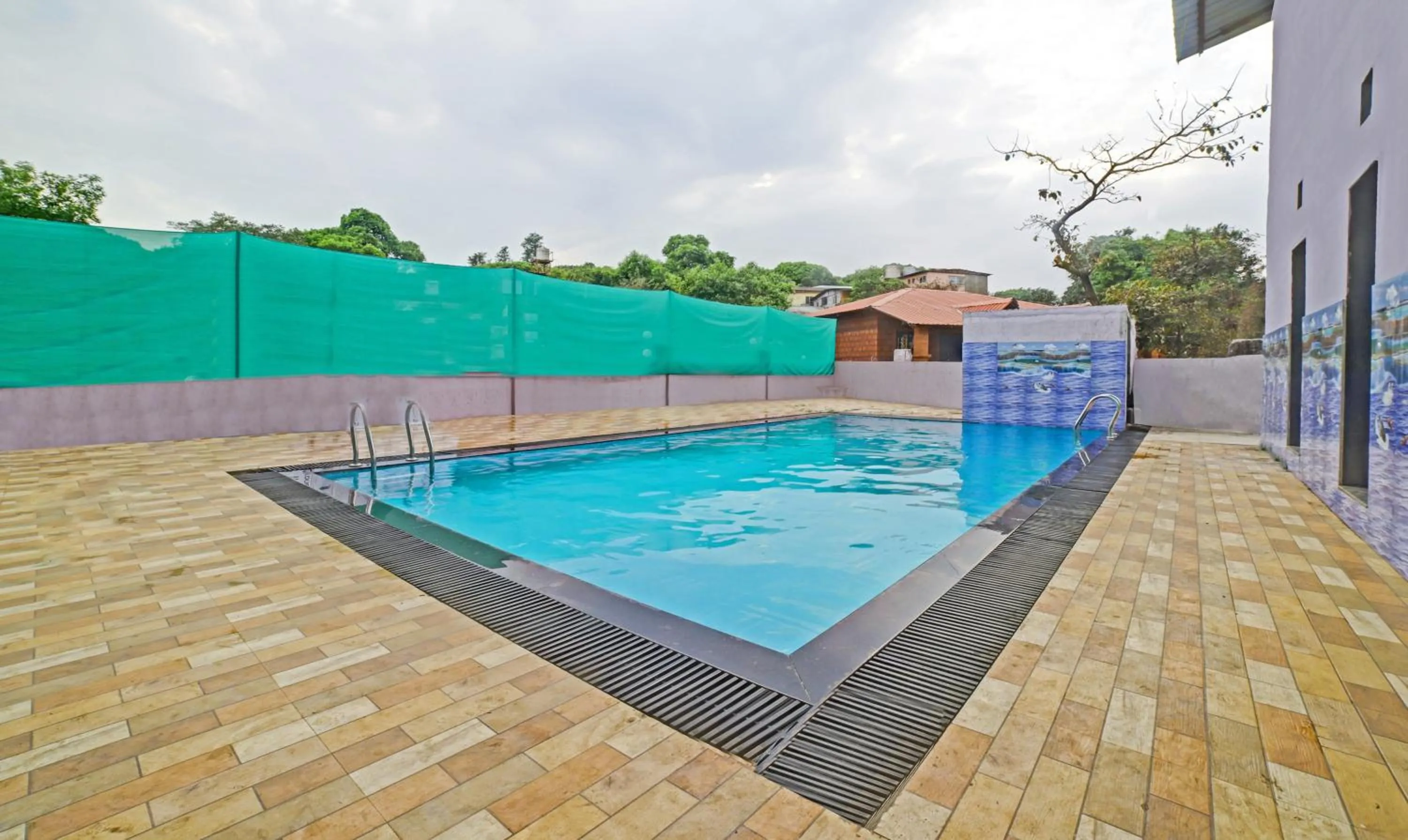 Swimming pool in Treebo Balaji Excellency with Pool & Spa