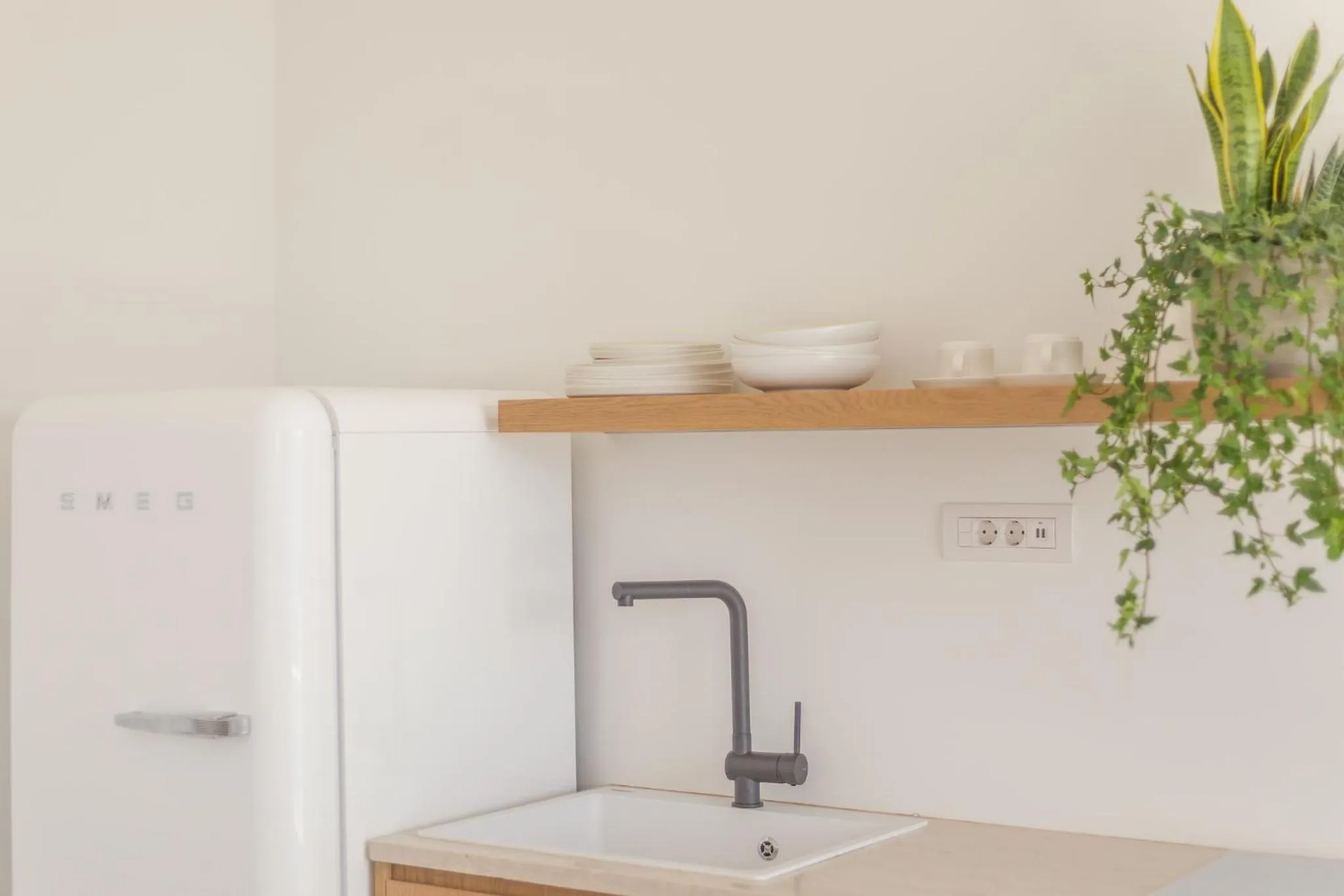 Kitchen or kitchenette in Amarelo Suites