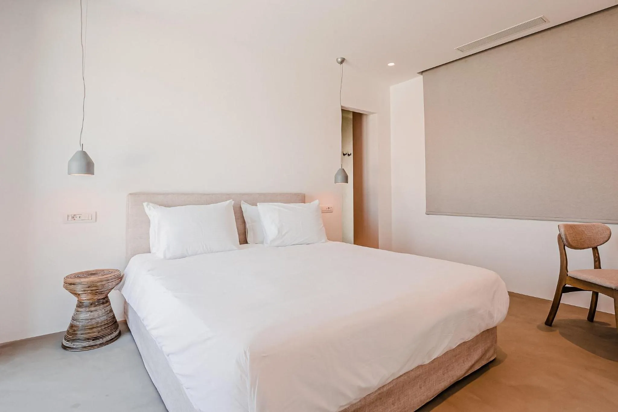 Bed in Amarelo Suites