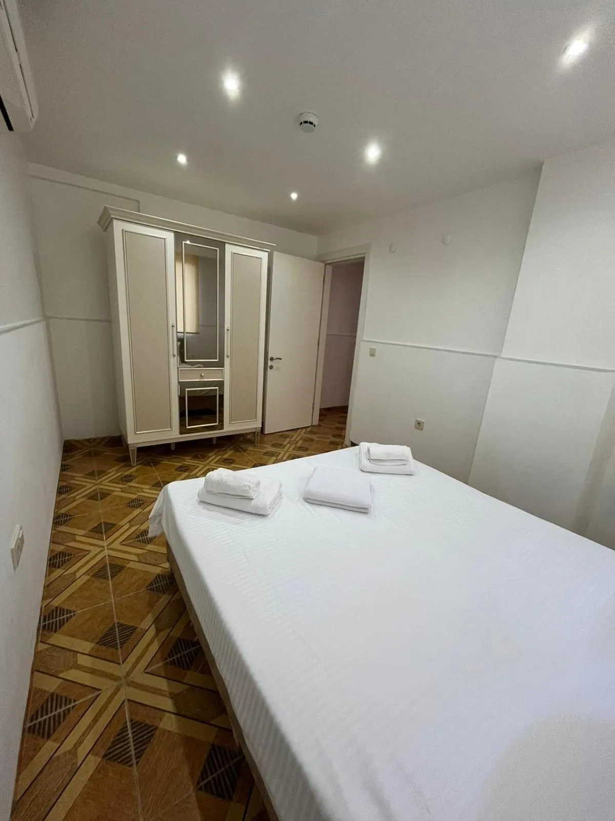 Bed in Onix Apart Hotel