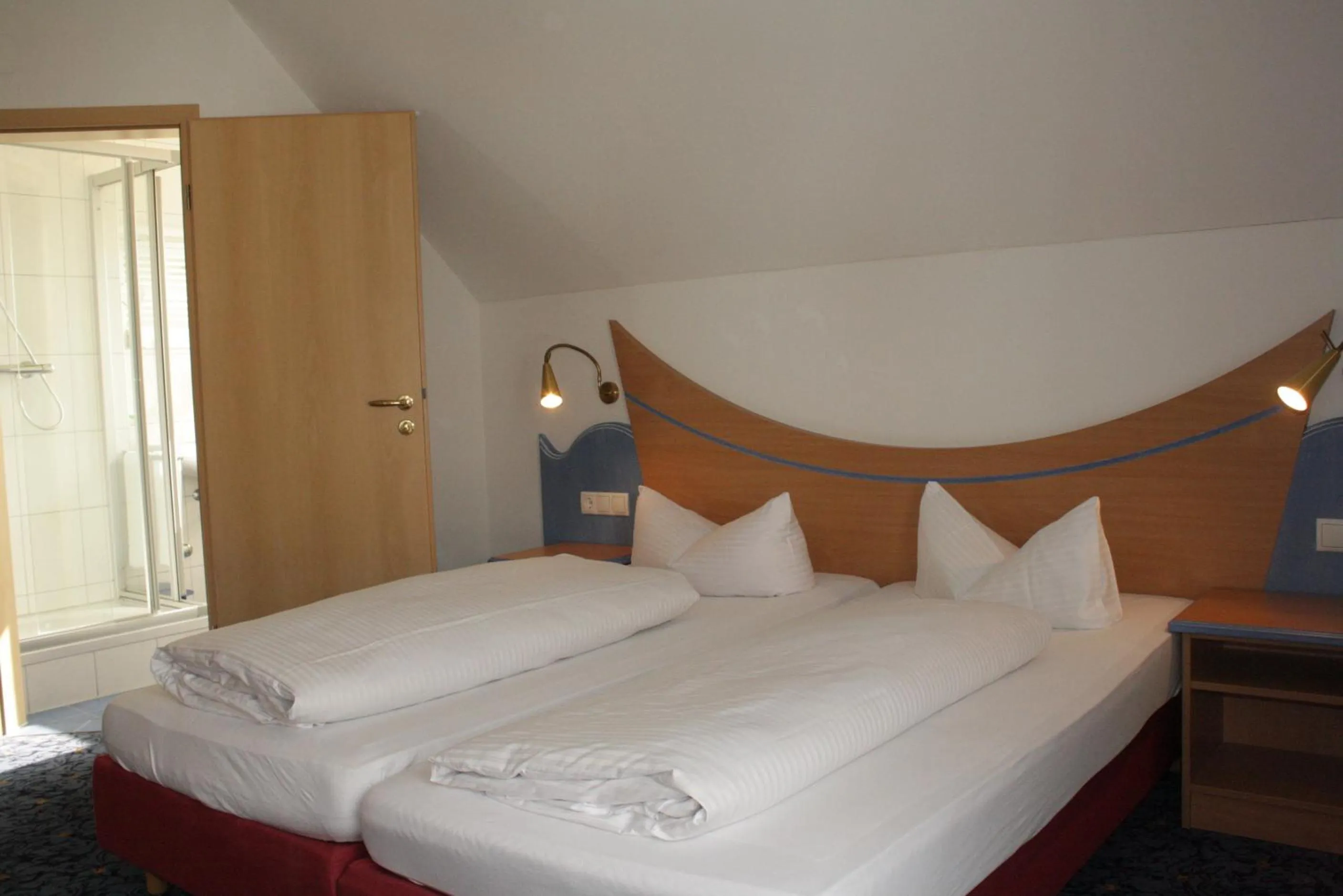Photo of the whole room, Bed in Hotel Waldhorn