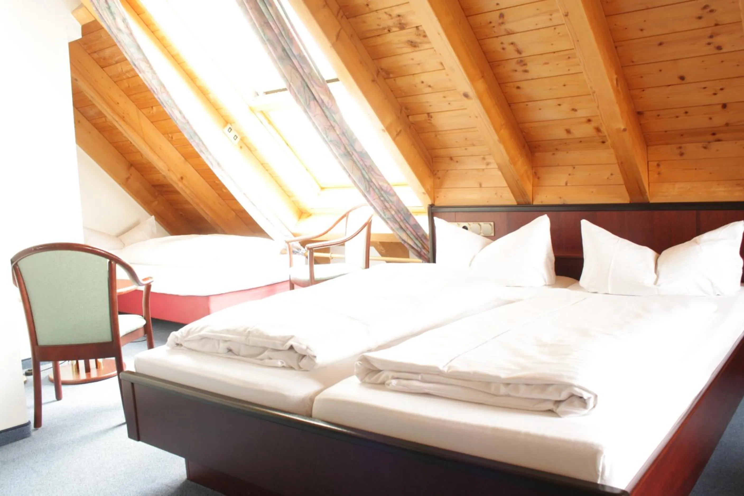 Photo of the whole room, Bed in Hotel Waldhorn