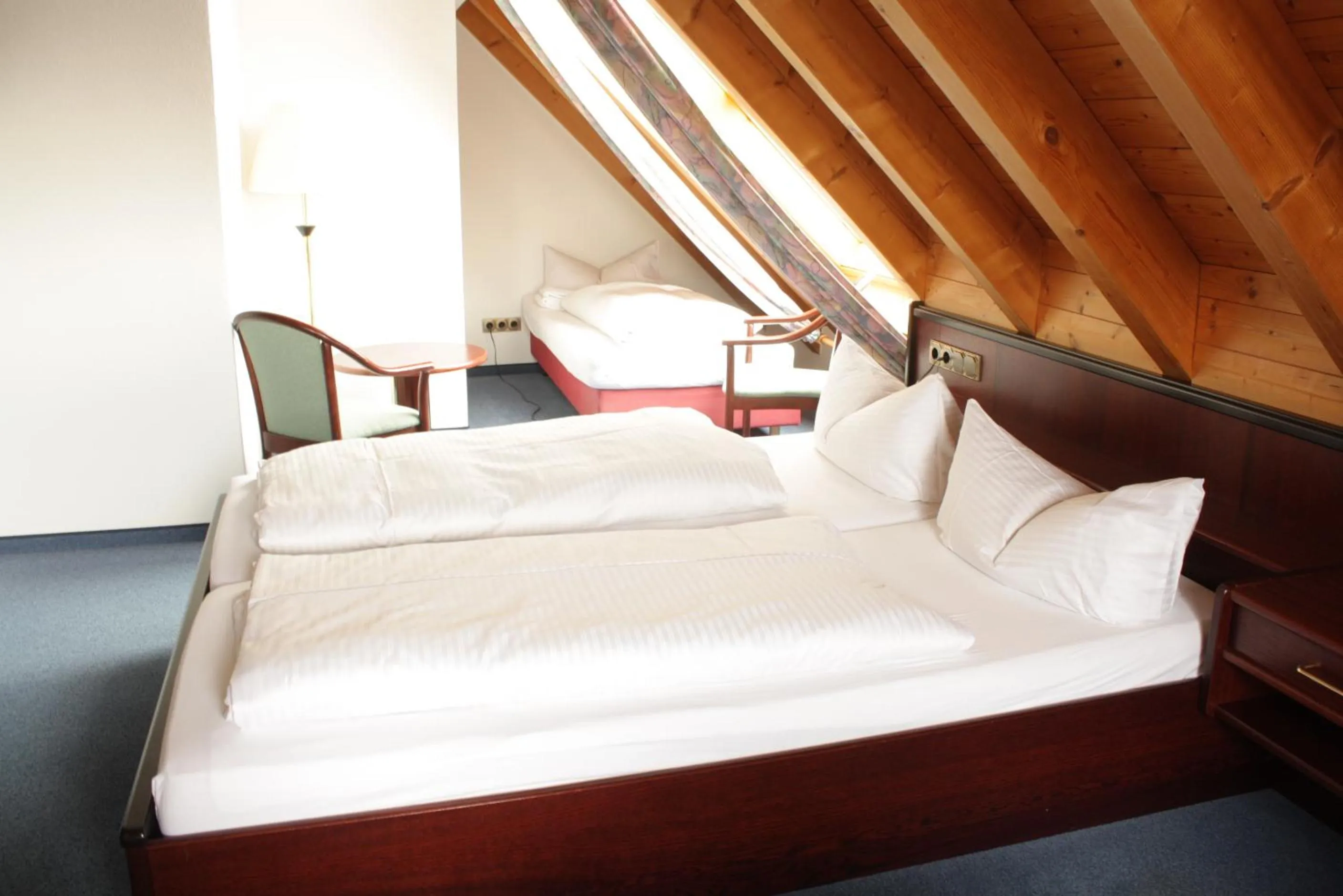 Photo of the whole room, Bed in Hotel Waldhorn
