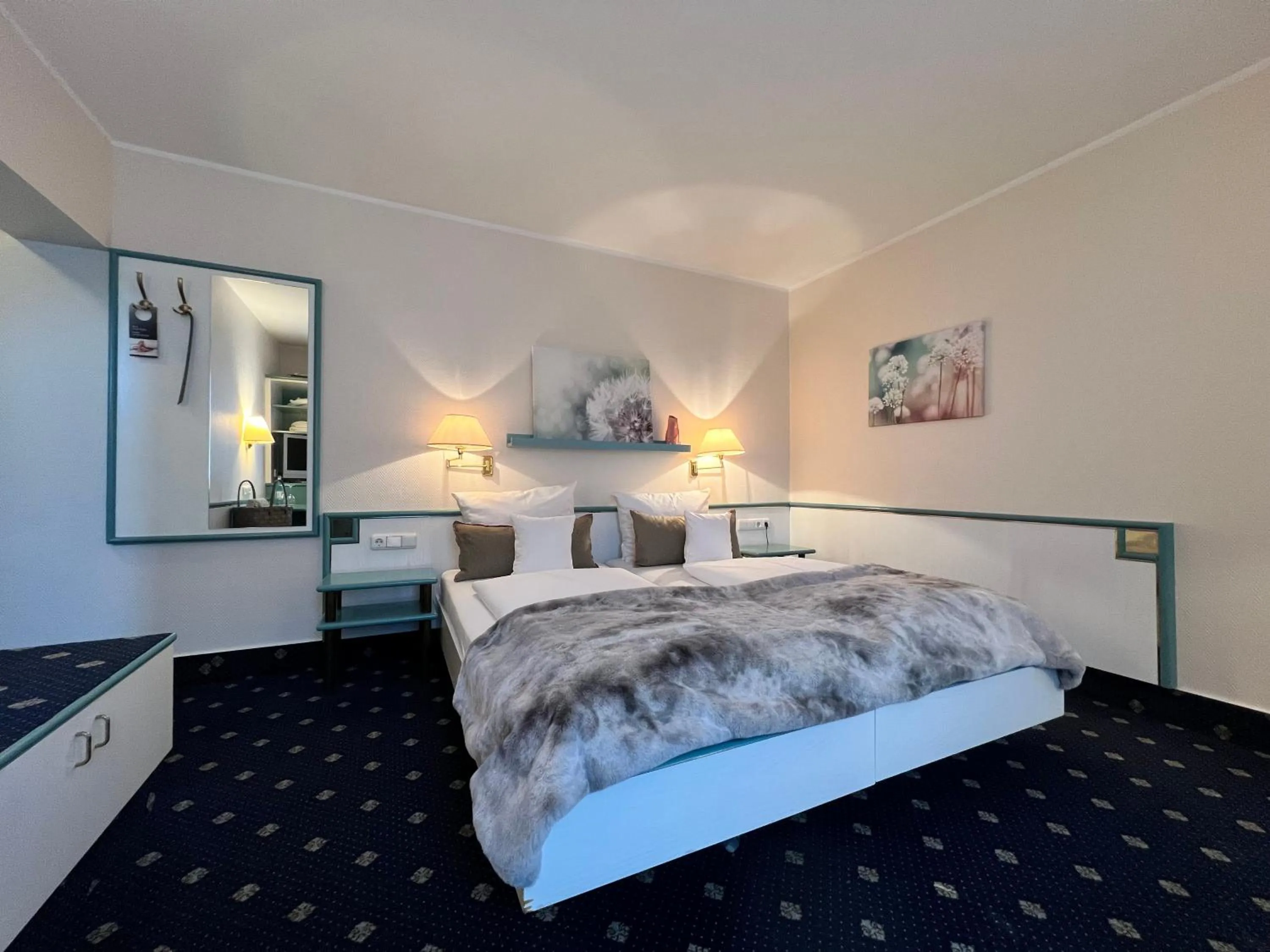 Bed in PANORAMA Hotel Heimbuchenthal