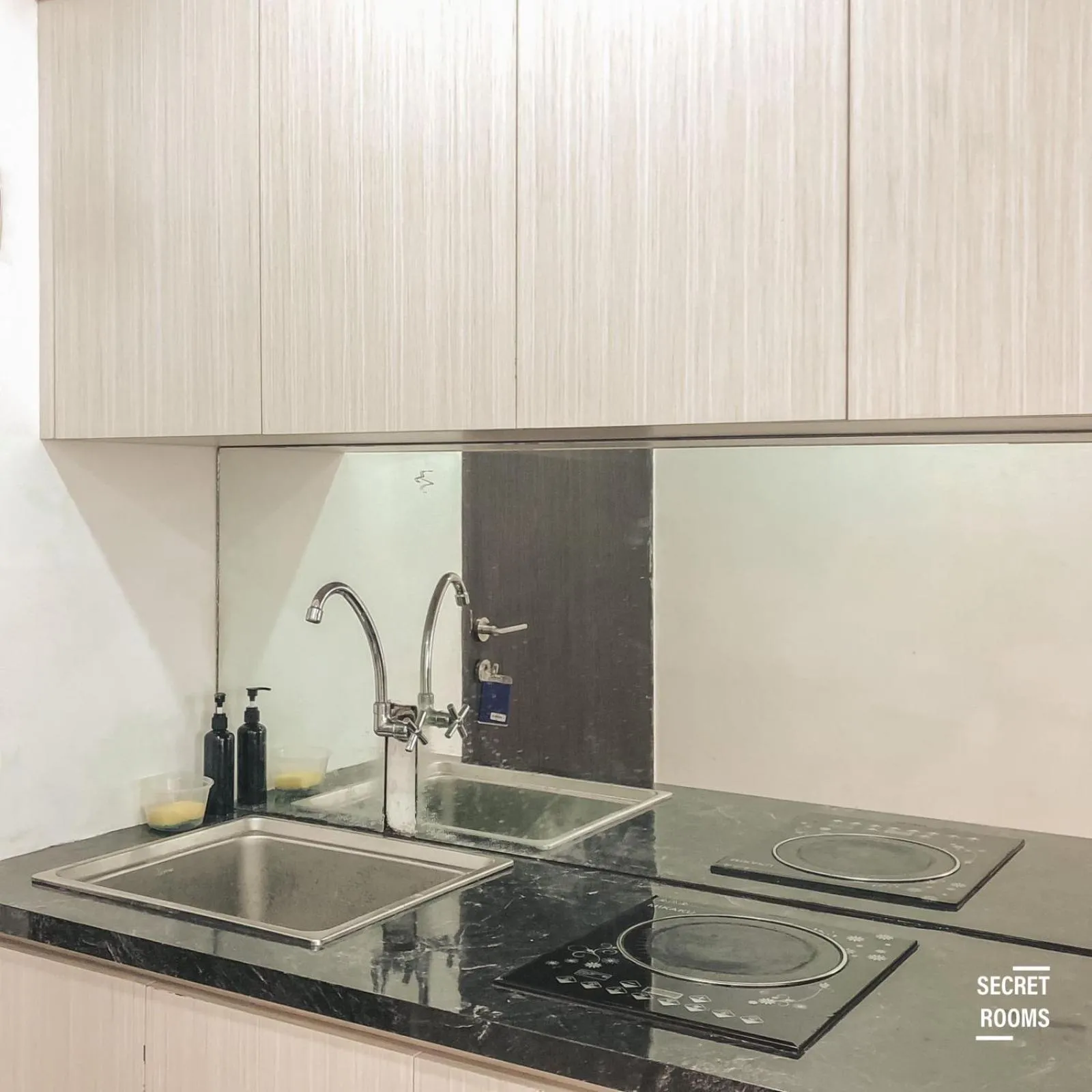 kitchen in The Jarrdin Apartement by Secret Rooms