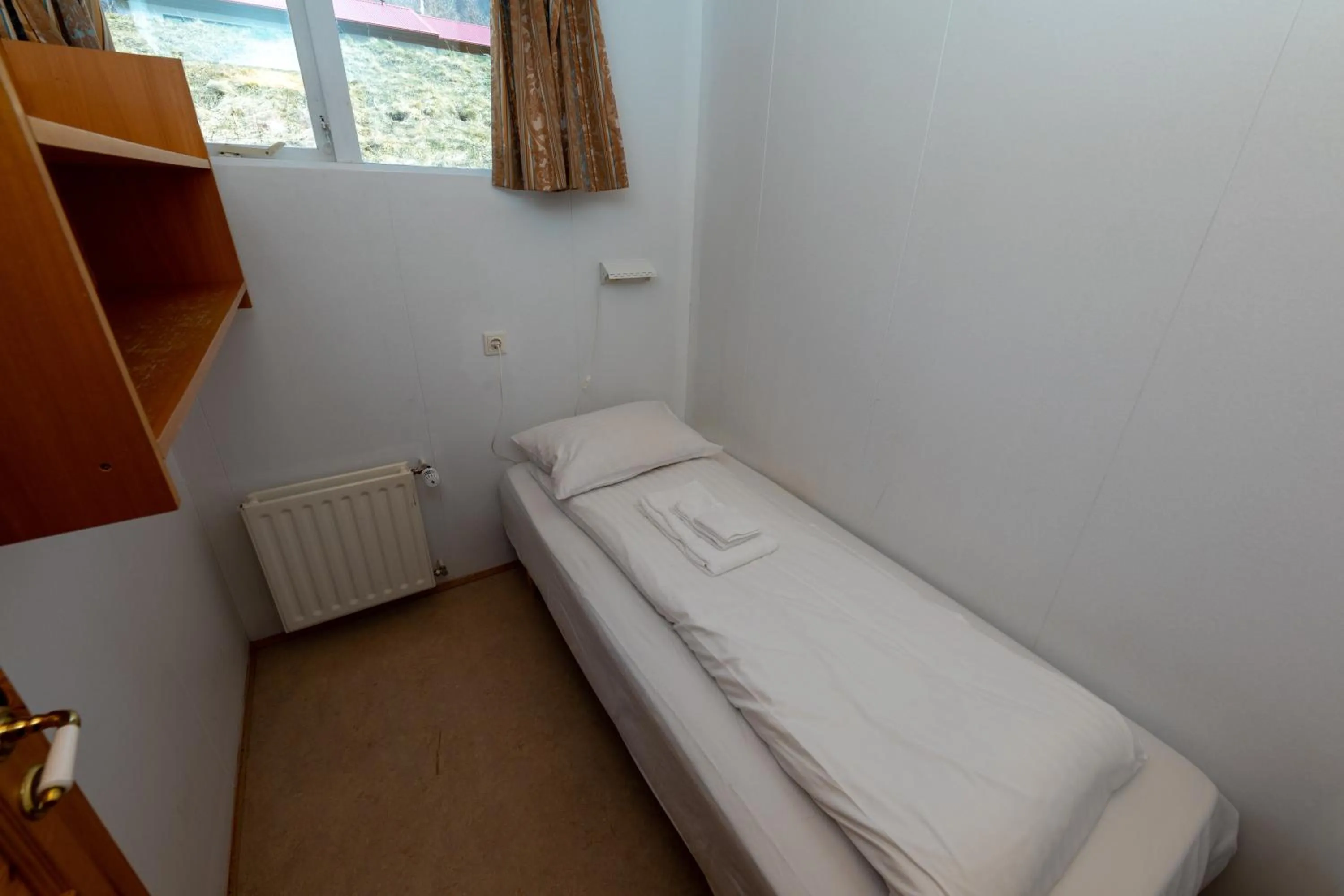 Bed in Kaffi Holar Cottages and Apartments