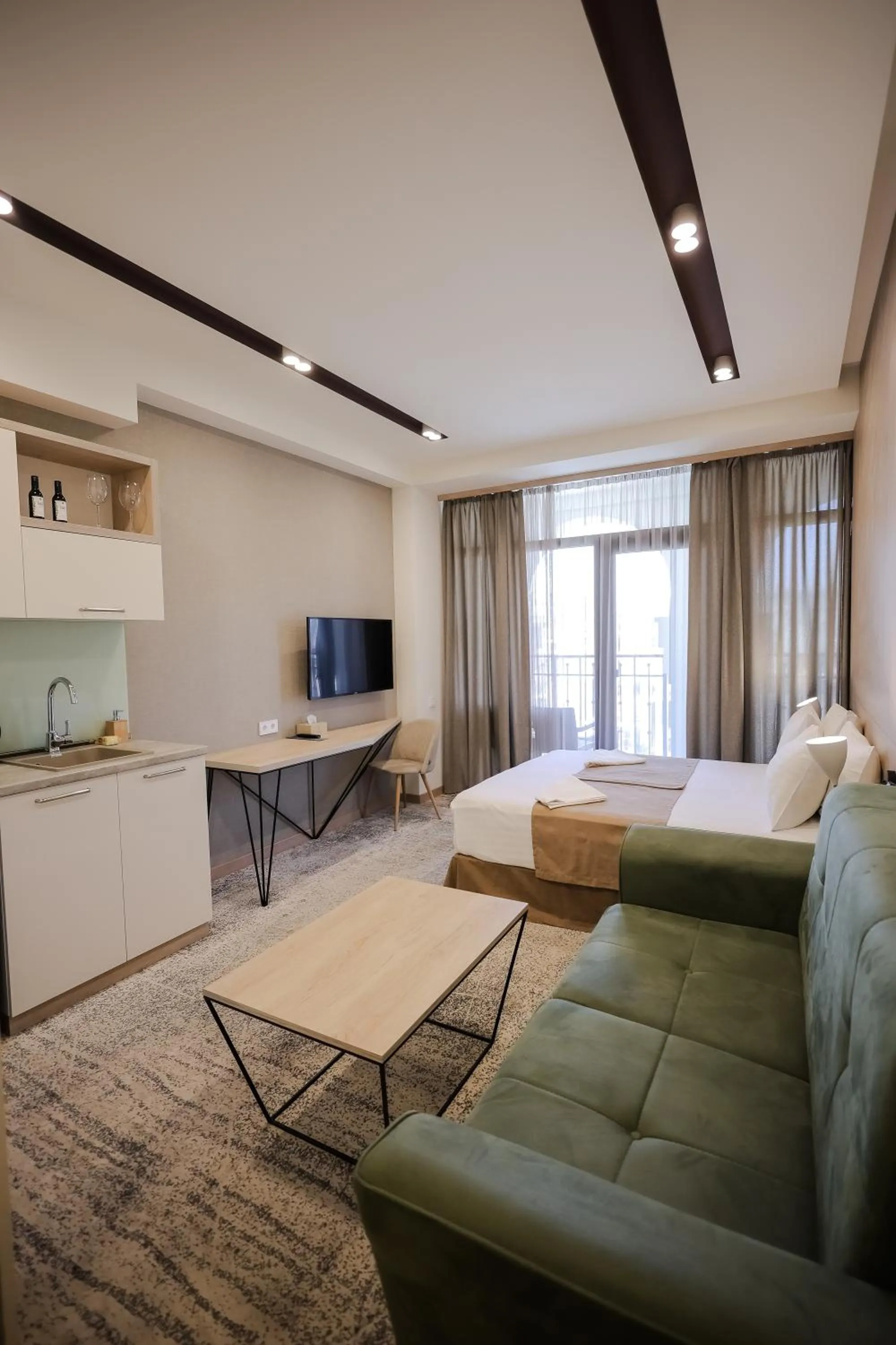 Photo of the whole room, Bed in Rooftop Apart-Hotel