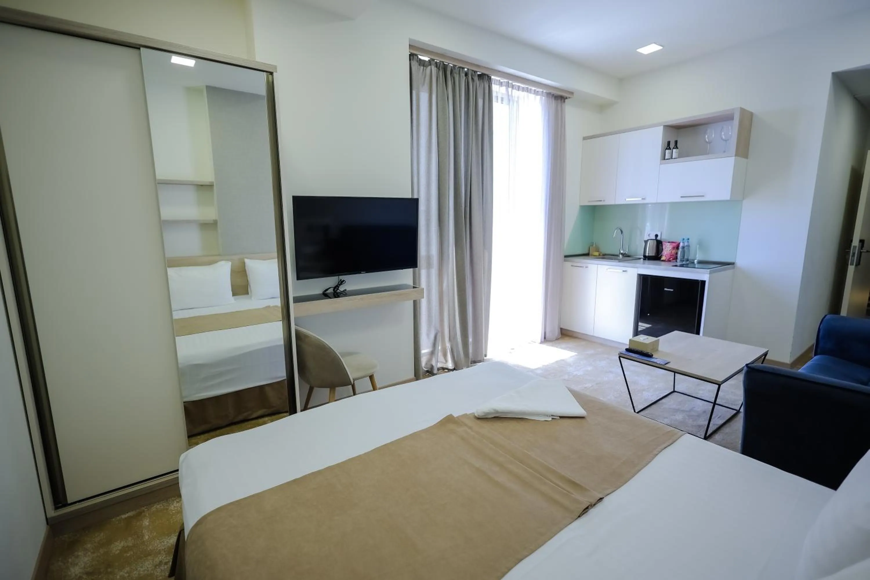 Photo of the whole room, Bed in Rooftop Apart-Hotel