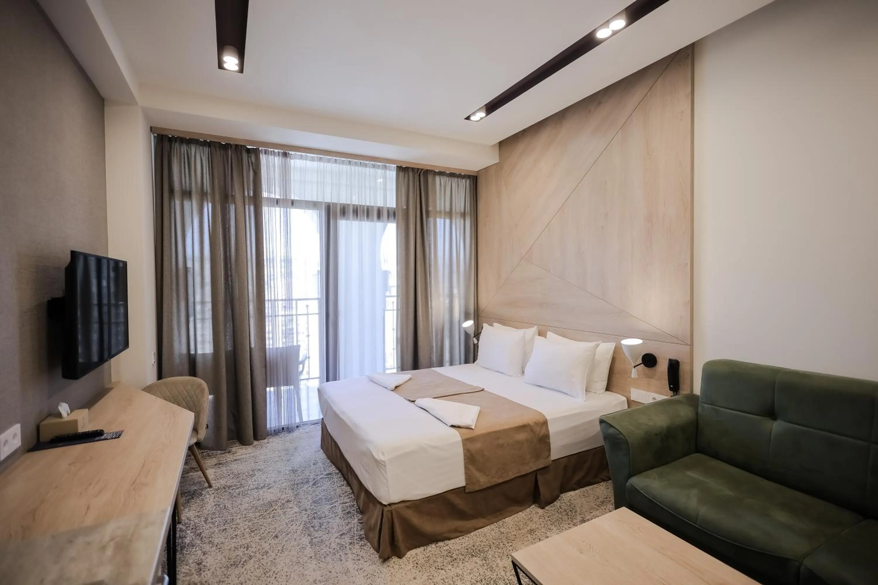 Photo of the whole room, Bed in Rooftop Apart-Hotel