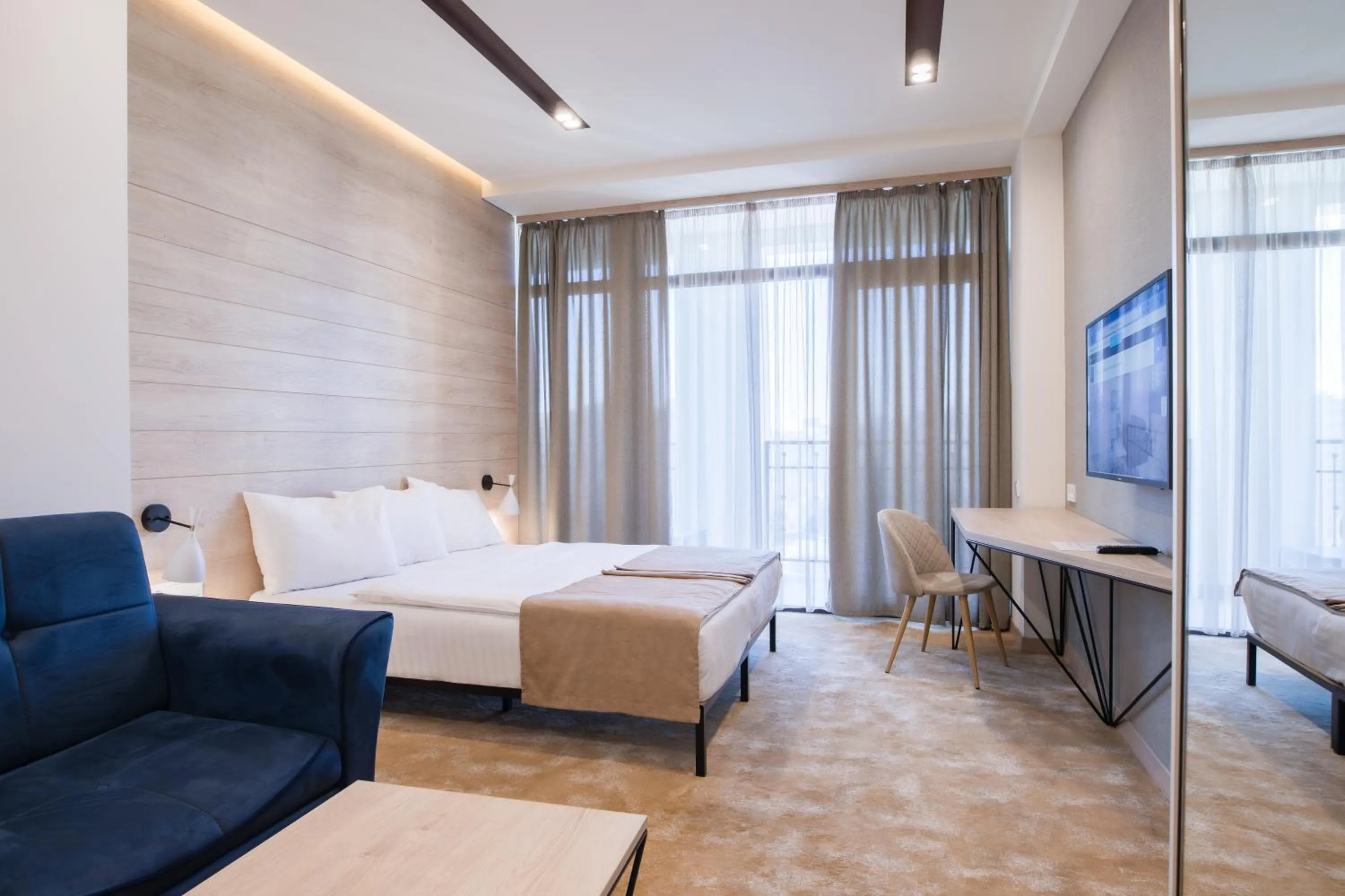 Photo of the whole room, Bed in Rooftop Apart-Hotel