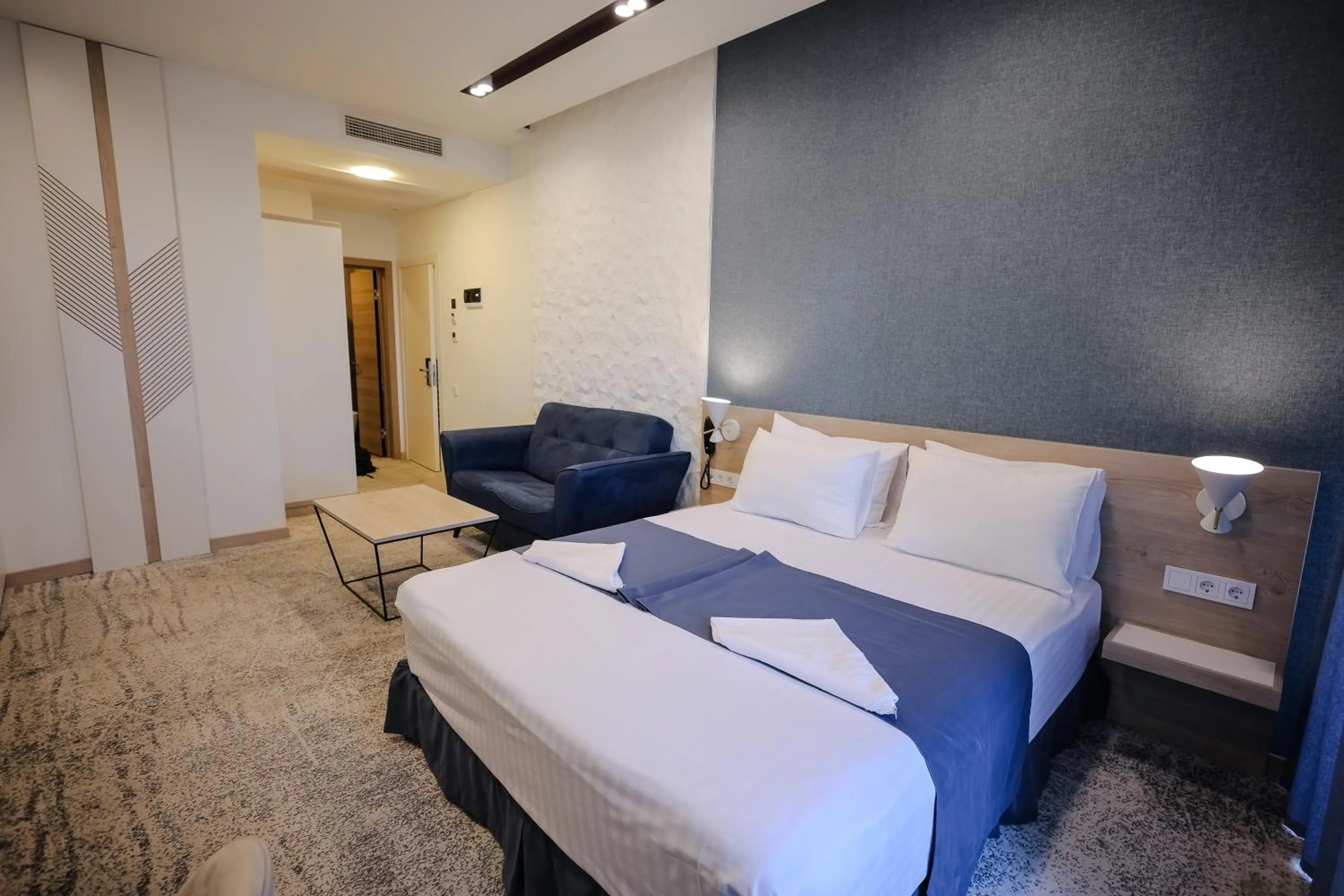 Bed in Rooftop Apart-Hotel