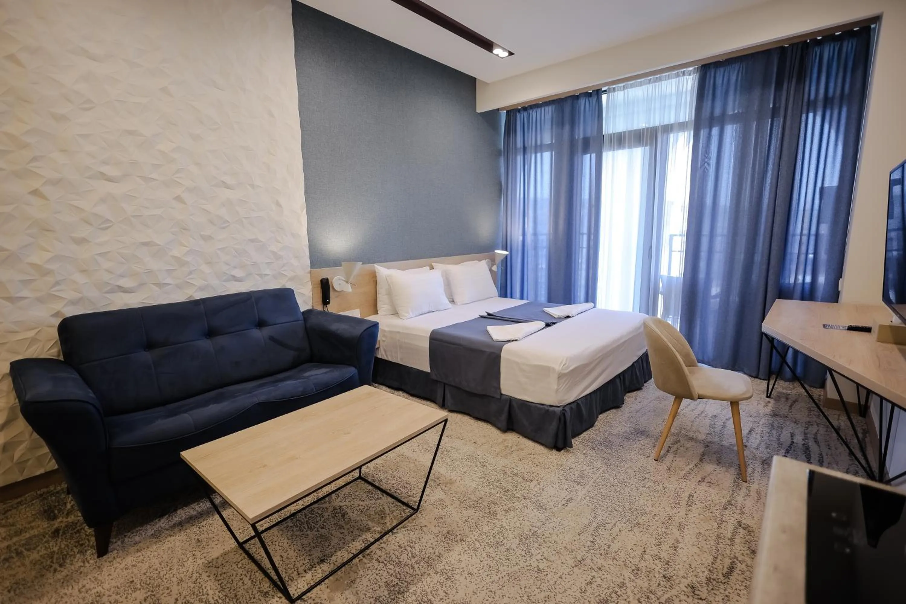 Photo of the whole room, Bed in Rooftop Apart-Hotel