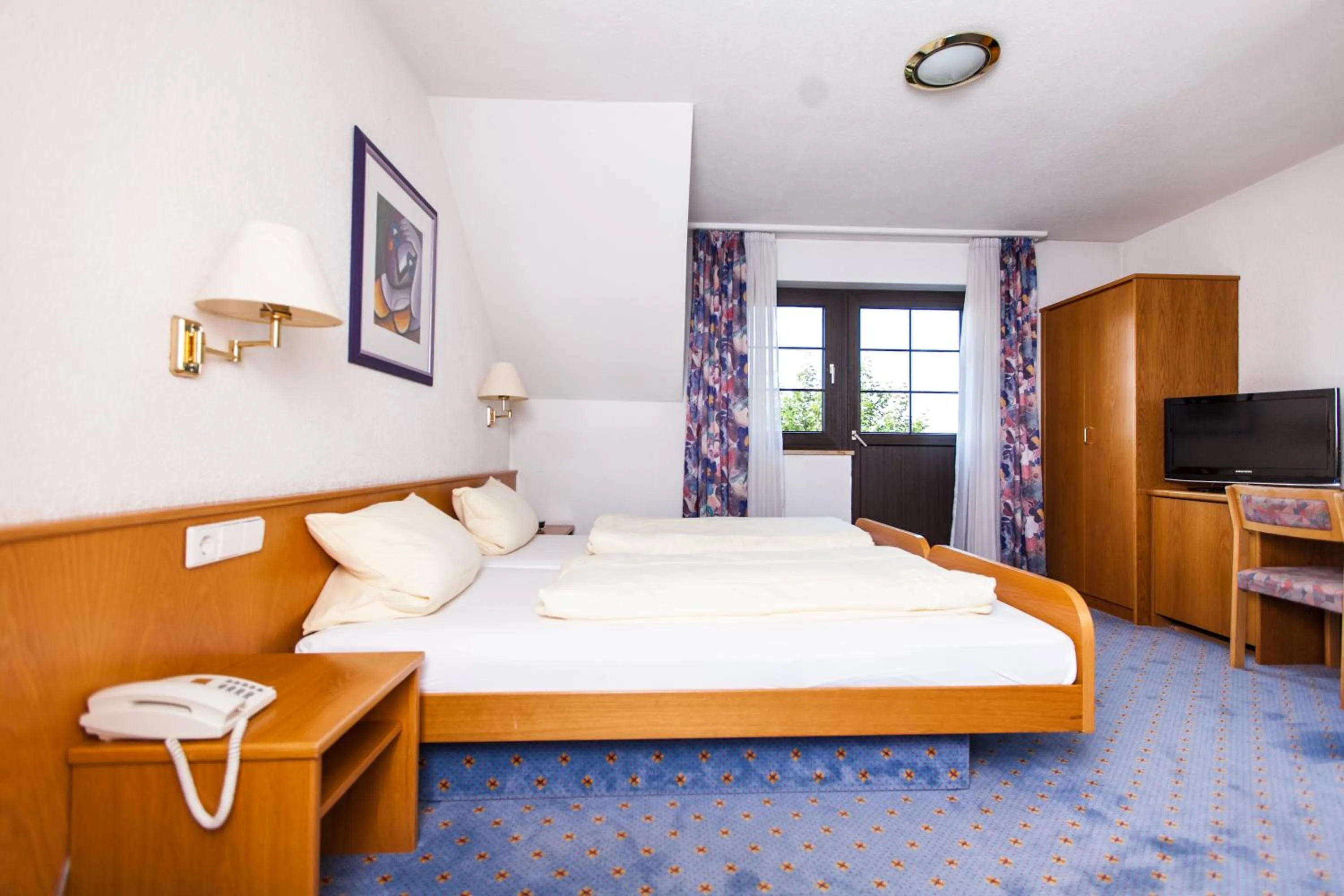 Bed in Landgasthaus Hotel Maien