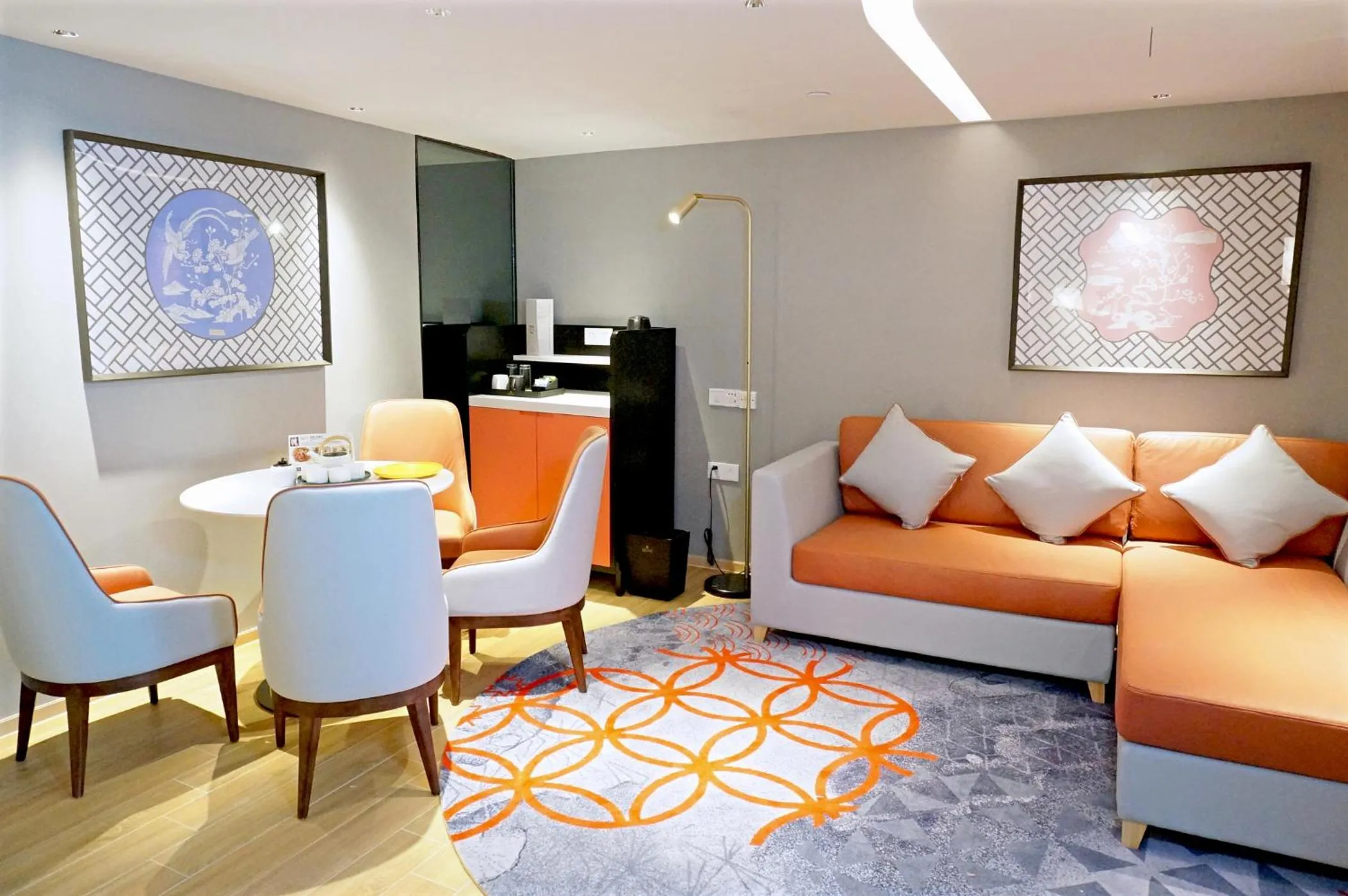 Living room in voco Guangzhou Shifu by IHG