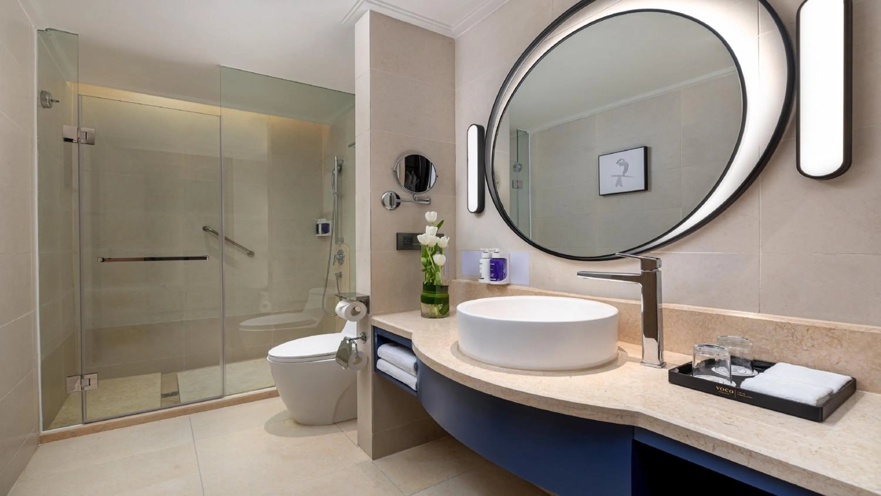 Bathroom in voco Guangzhou Shifu by IHG