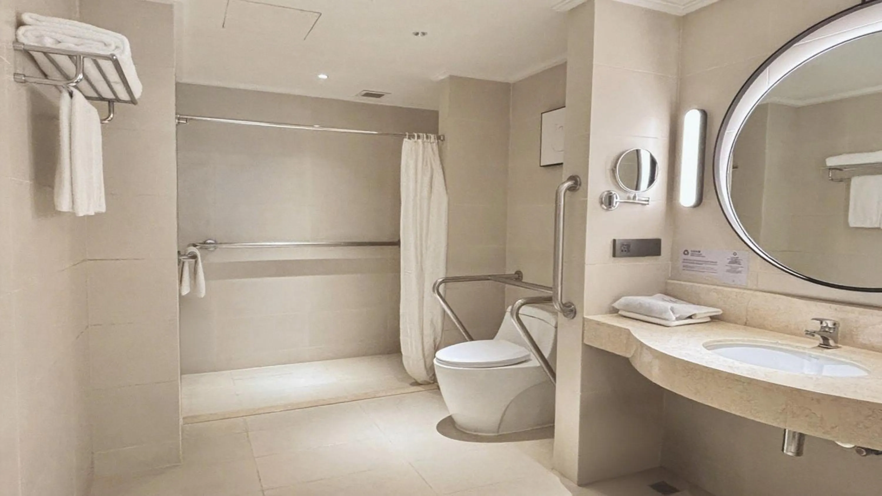 Bathroom in voco Guangzhou Shifu by IHG