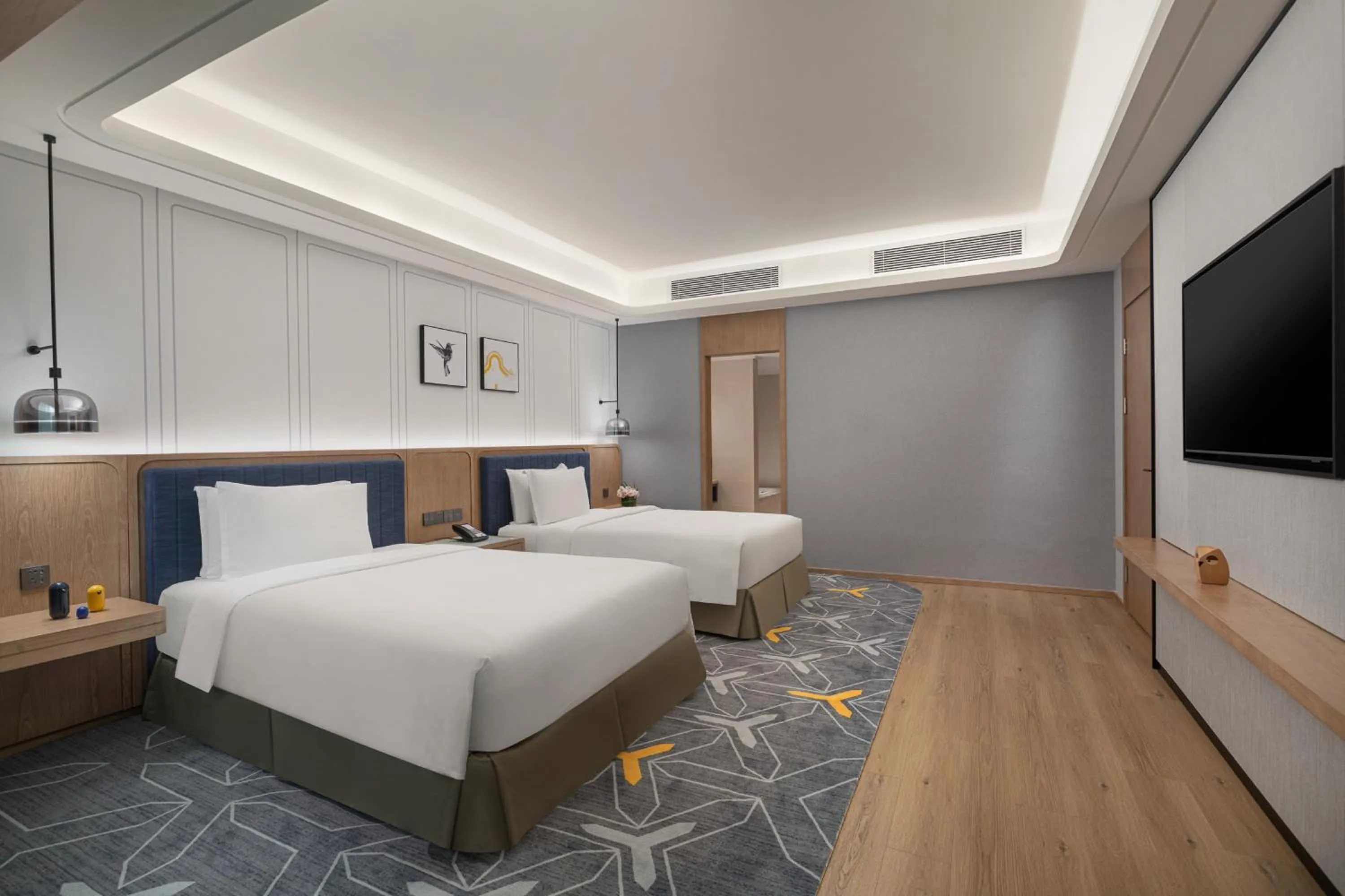 Bed in voco Guangzhou Shifu by IHG