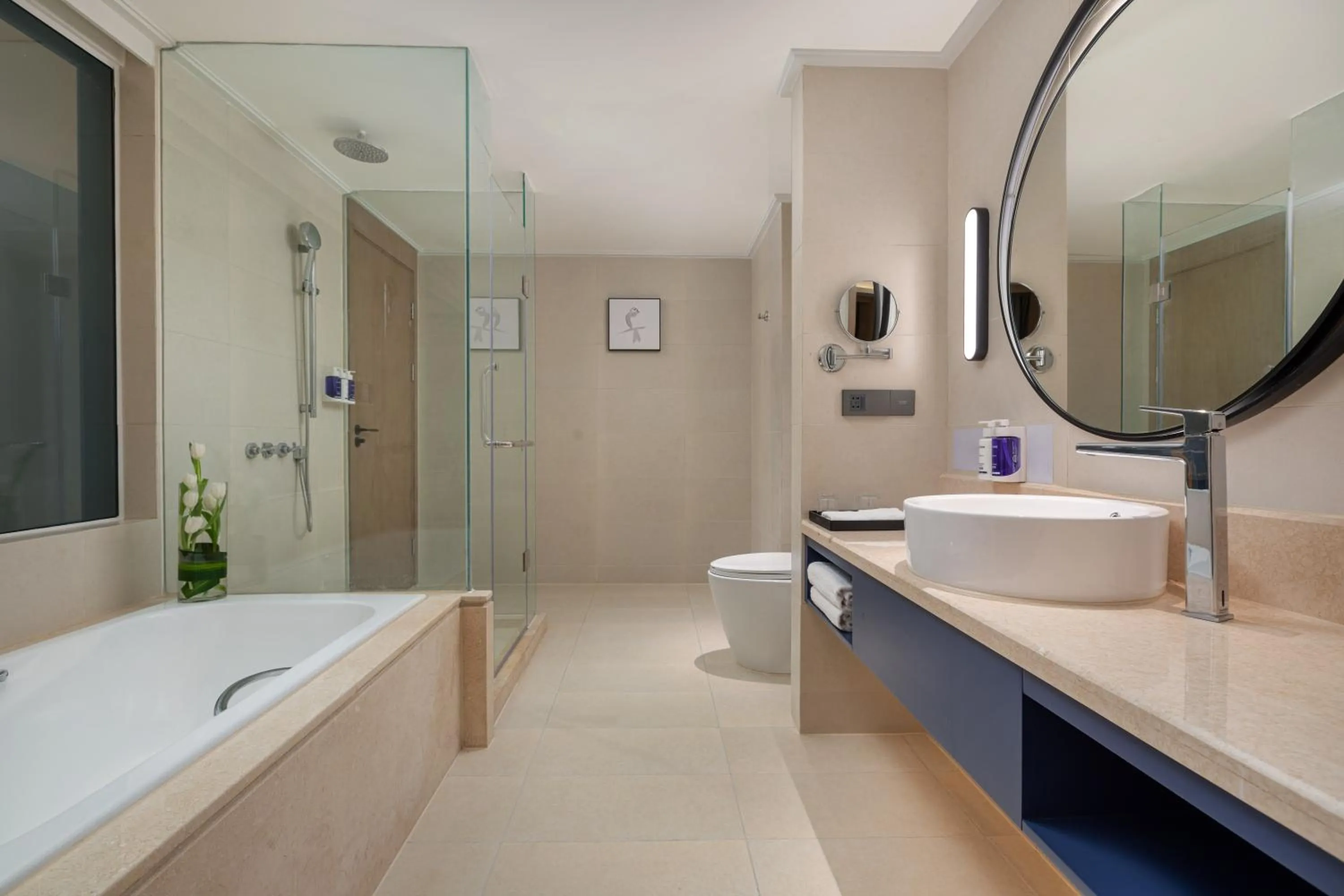 Toilet in voco Guangzhou Shifu by IHG