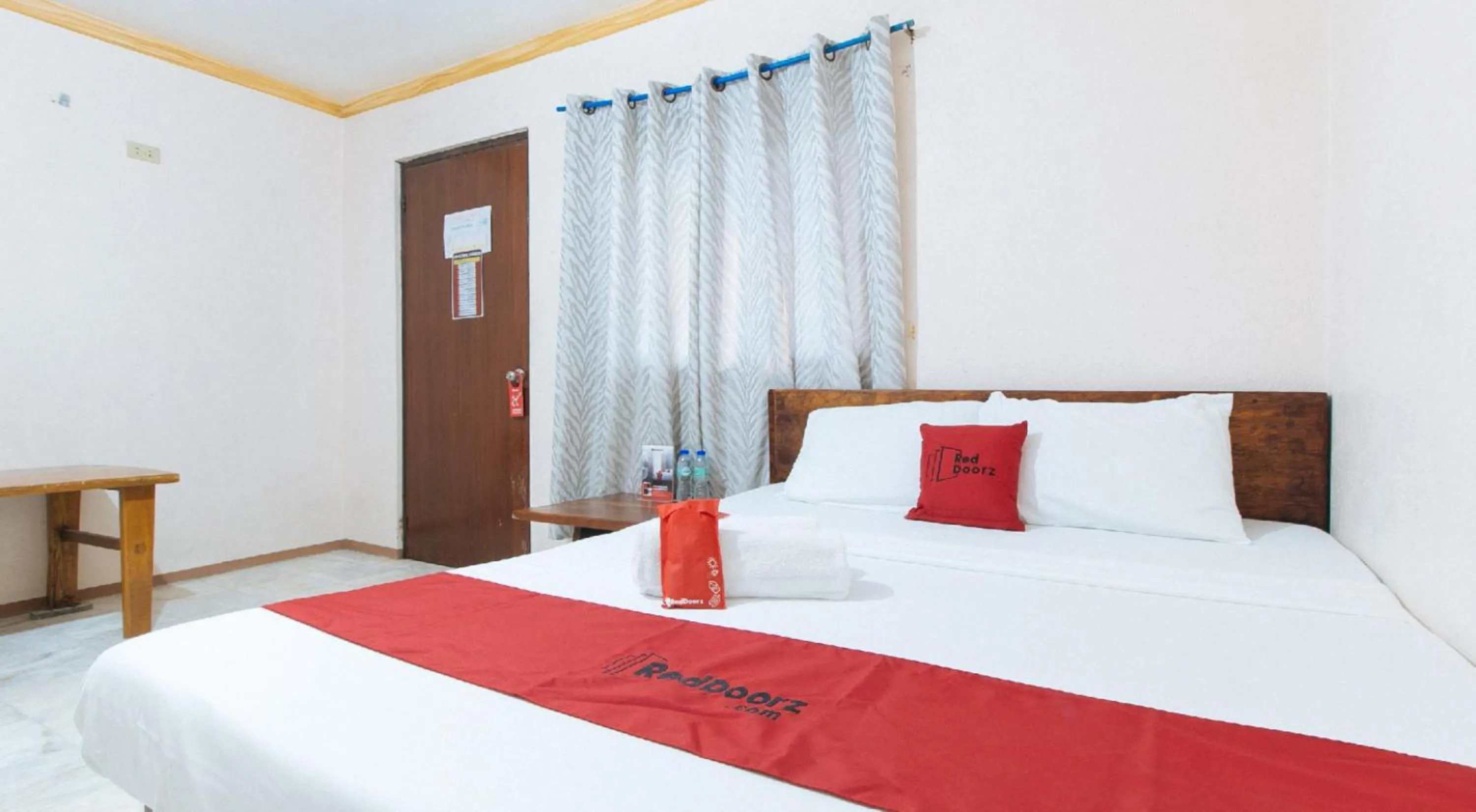 Bedroom, Bed in RedDoorz Hostel at Megans Paradisio Beach Resort