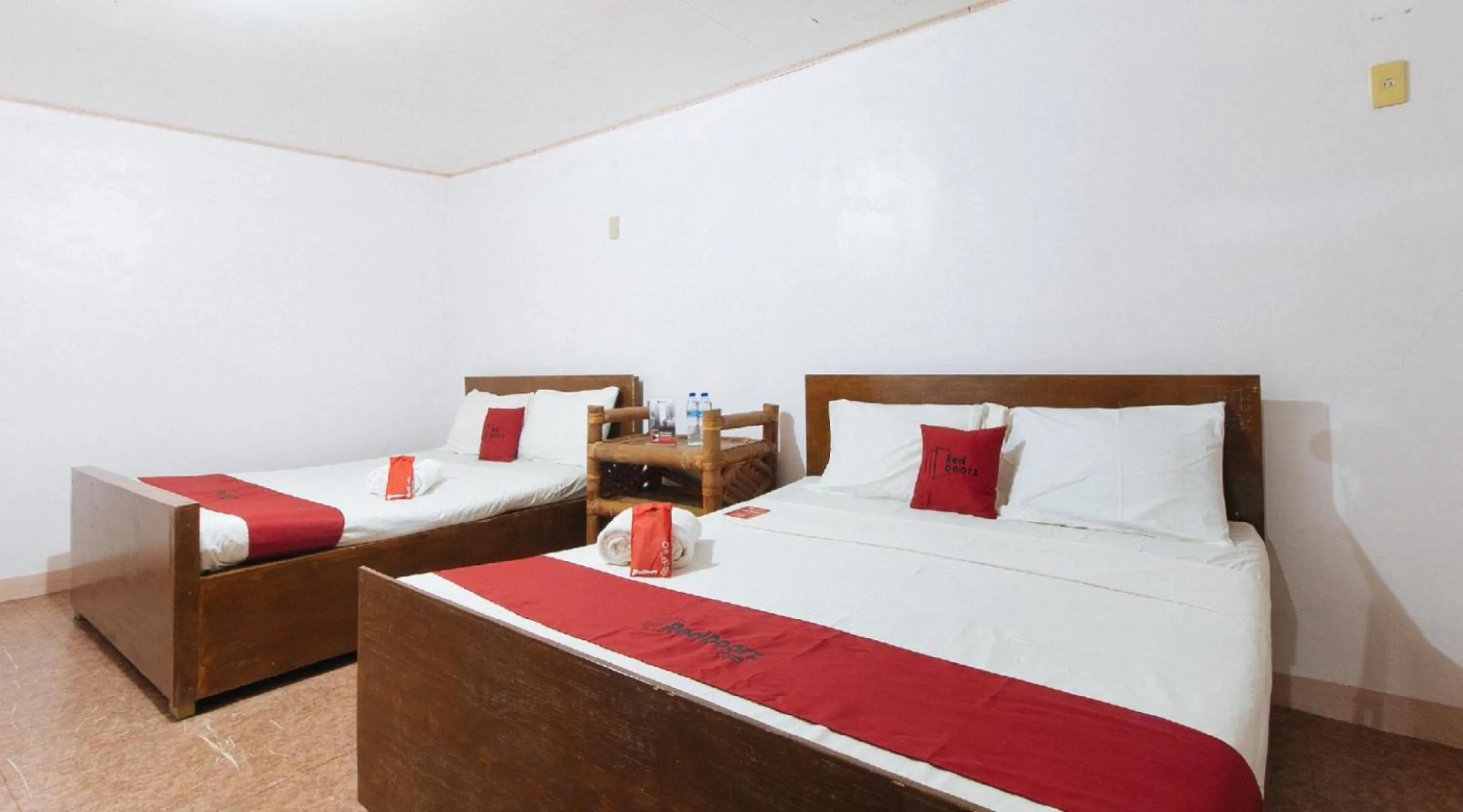 Bedroom, Bed in RedDoorz Hostel at Megans Paradisio Beach Resort