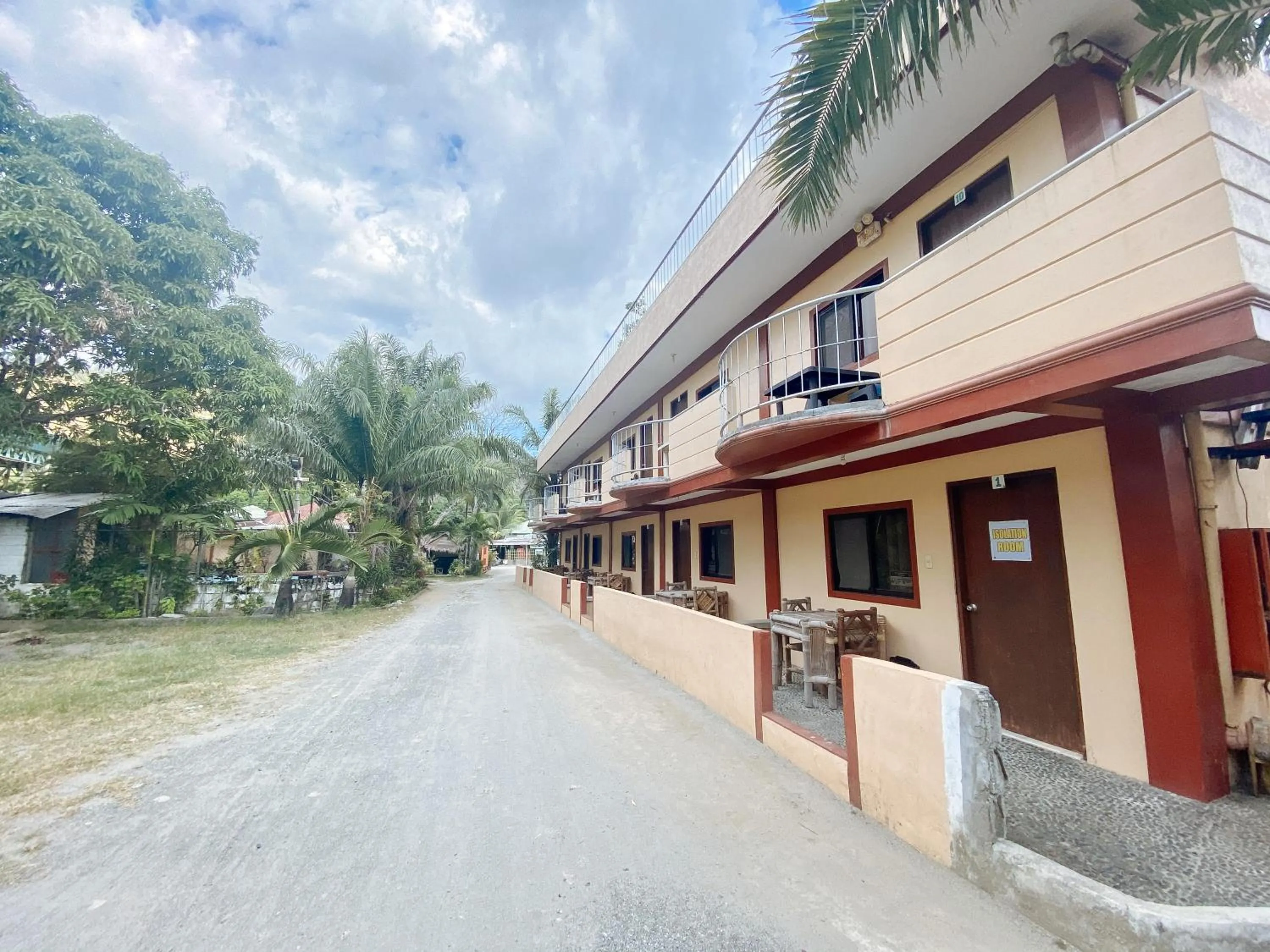 Property building in RedDoorz Hostel at Megans Paradisio Beach Resort