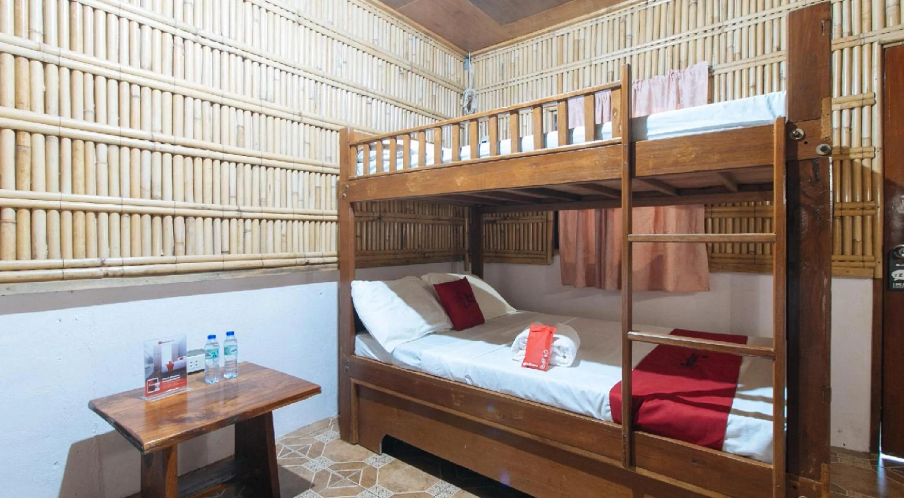bunk bed, Bed in RedDoorz Hostel at Megans Paradisio Beach Resort