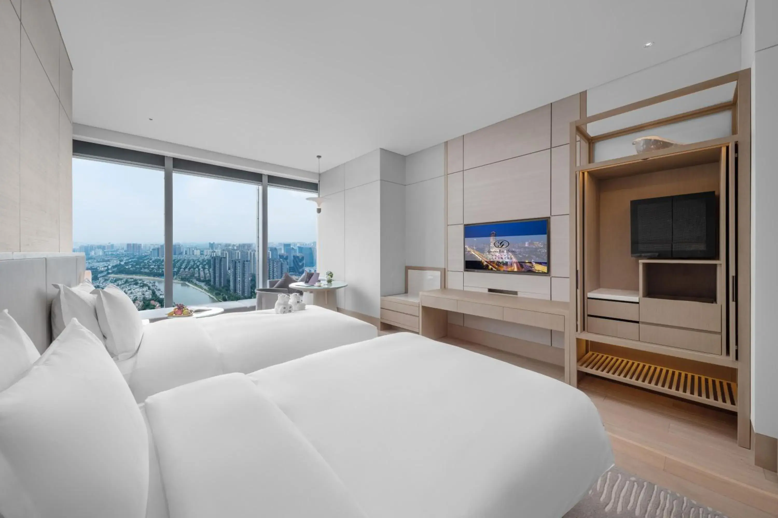Deluxe Twin Room -River View 1 welcome fruit on the first day, 1 voucher for 300 RMB for Health Center, 1 voucher for playing 1000㎡children's playground, 1 single cocktail in Grand Bay Hotel Chengdu Deluxe Twin Room -River View 1 welcome fruit on the first day, 1 voucher for 300 RMB for Health Center, 1 voucher for playing 1000㎡children's playground, 1 single cocktail in Grand Bay Hotel Chengdu