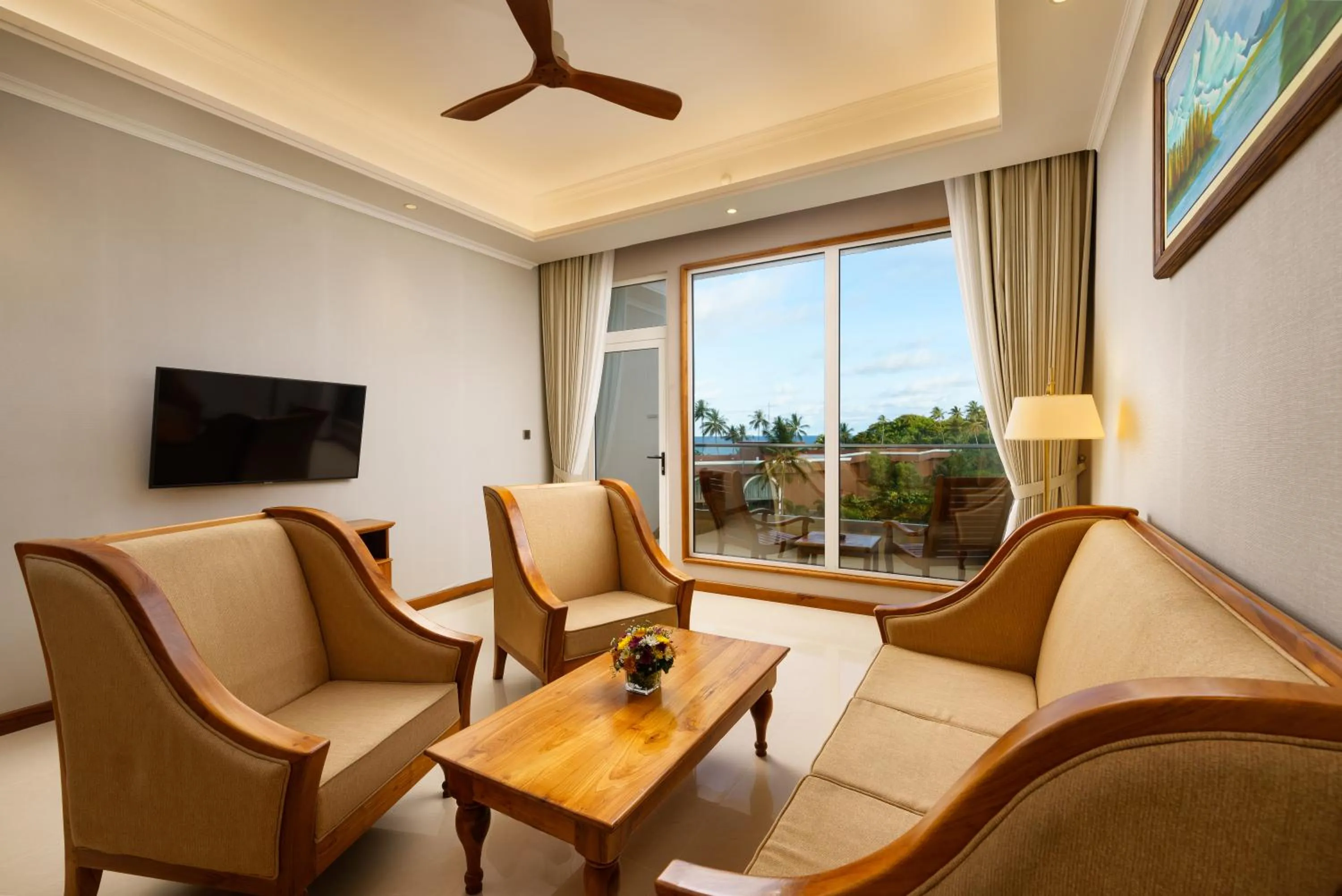 Seating area in Araliya Beach Resort & Spa Unawatuna- Where you meet the sea all year