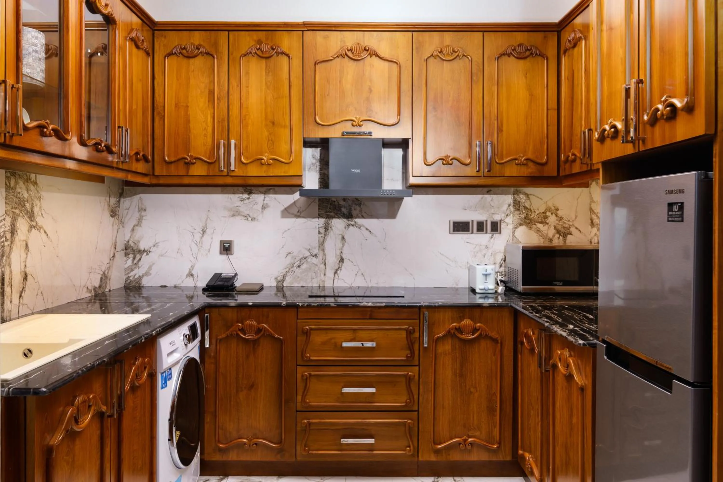 Kitchen or kitchenette in Araliya Beach Resort & Spa Unawatuna- Where you meet the sea all year