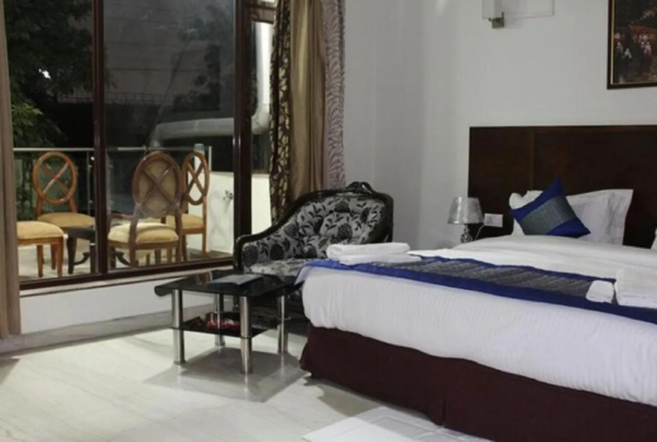 Balcony/Terrace, Bed in Lime Tree Hotel Sushant Lok Gurgaon Sector 29 Next to IFFCO CHOWK metro